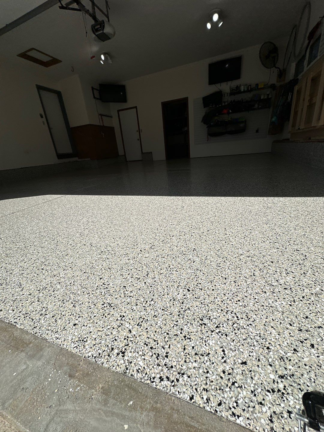 Two-Stall Epoxy Garage Floor Coating and Repair in Lincoln by Goat Coatings