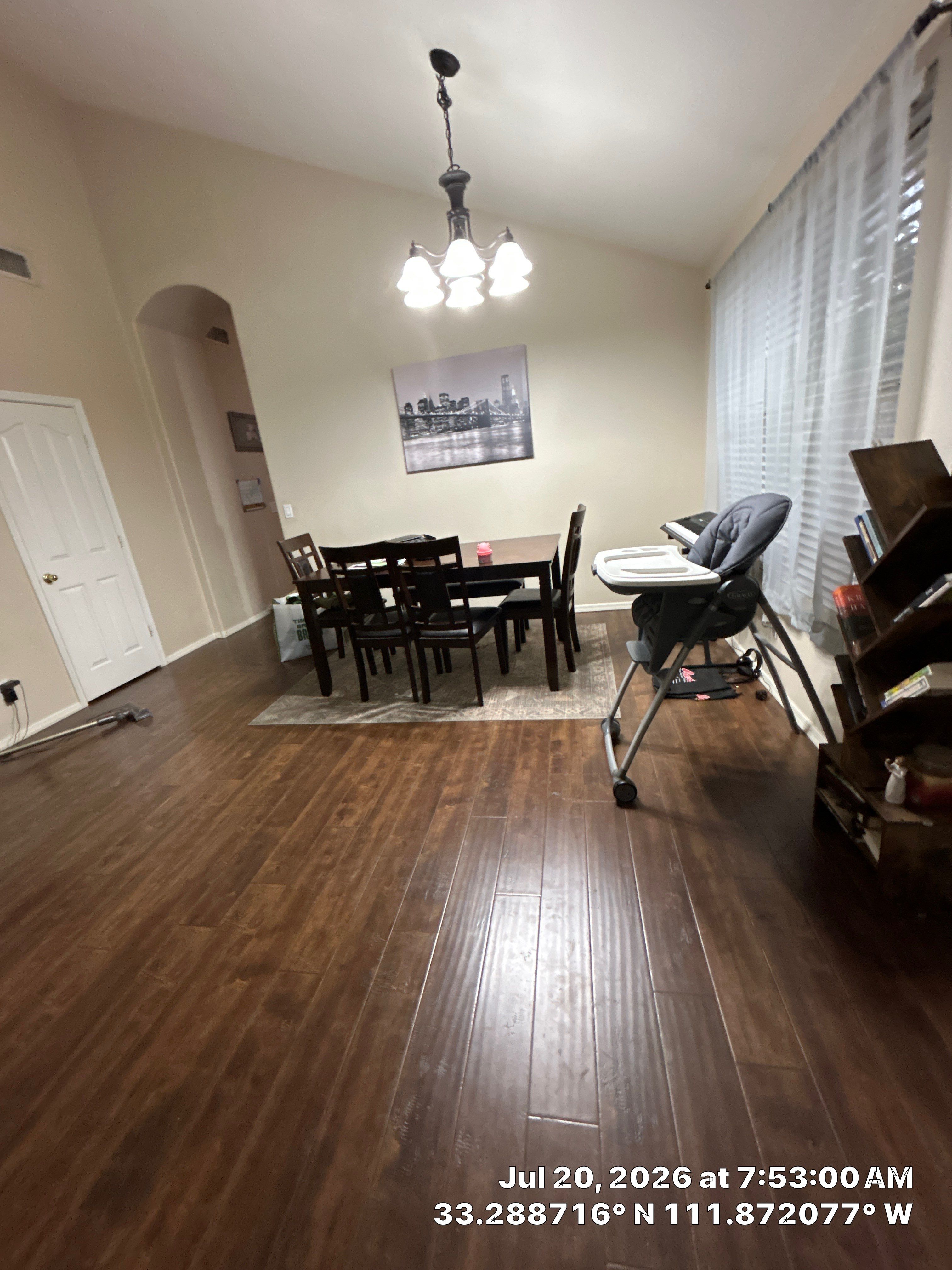 Dark Wood-Look Laminate Flooring Installation in Chandler Dining Room by CompanyCam Sales Demo