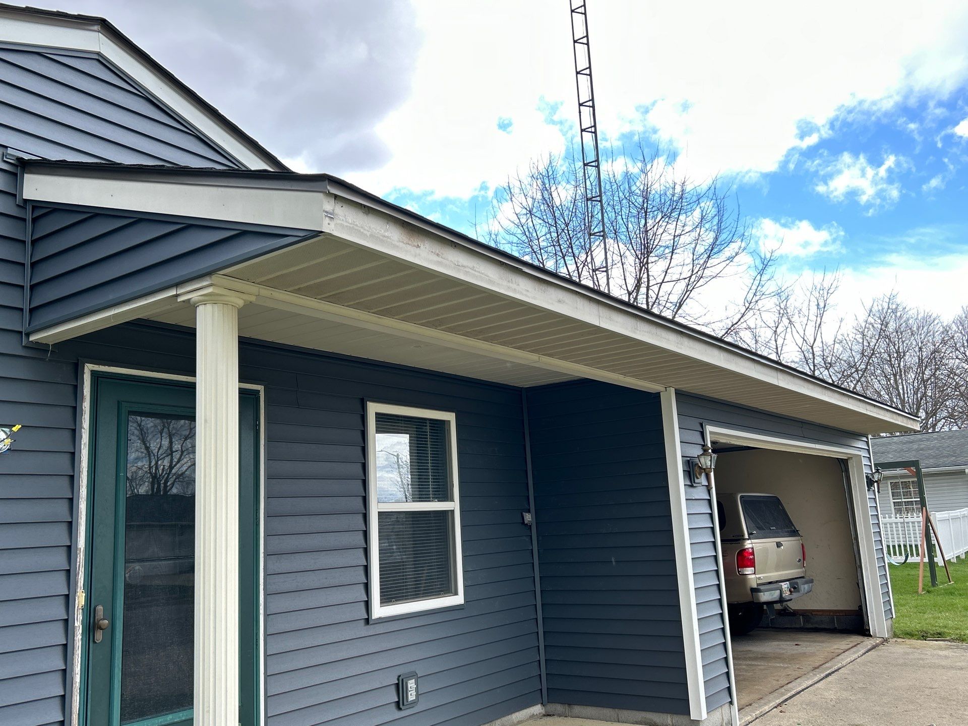Storm Damage Residential Roof and Siding Installation by WIW Enterprises Inc
