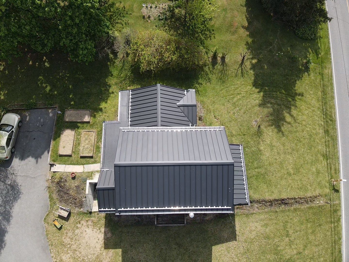 Residential Roofing Installation using Texture Standing Seam by Teflon Roofing