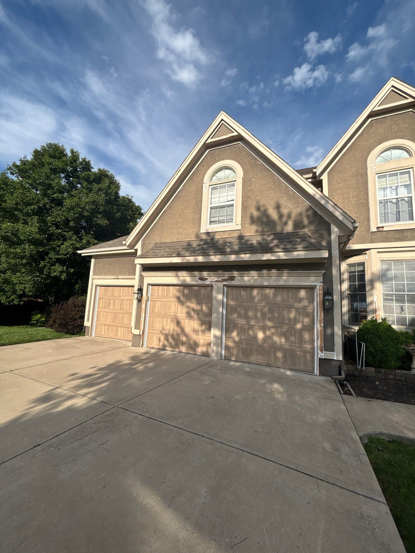 Exterior Painting and Wood Rot Repair for Overland Park Residence by Cougar Painting