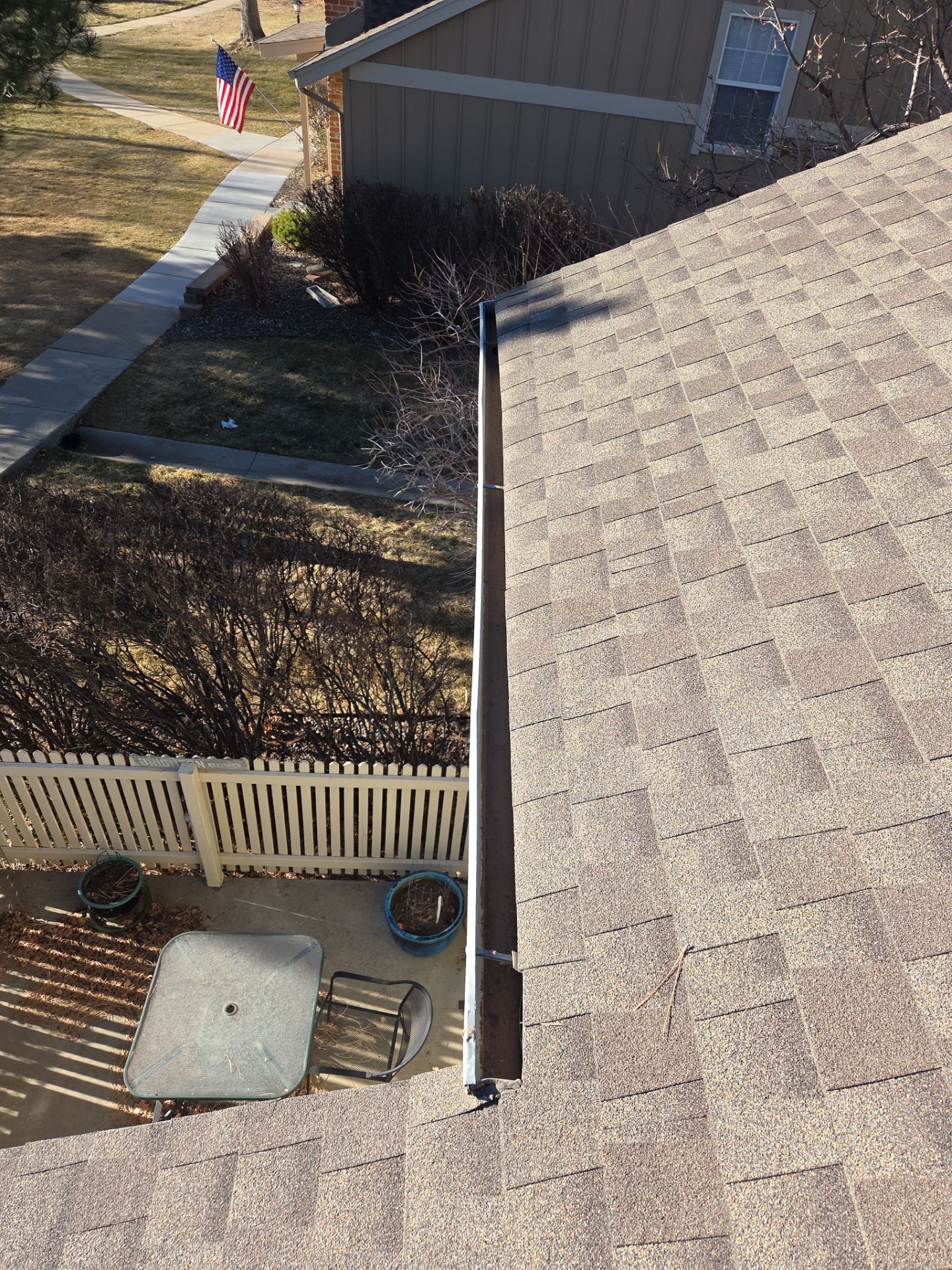 Gutter & Downspout Cleaning  by RTP Roofing Company
