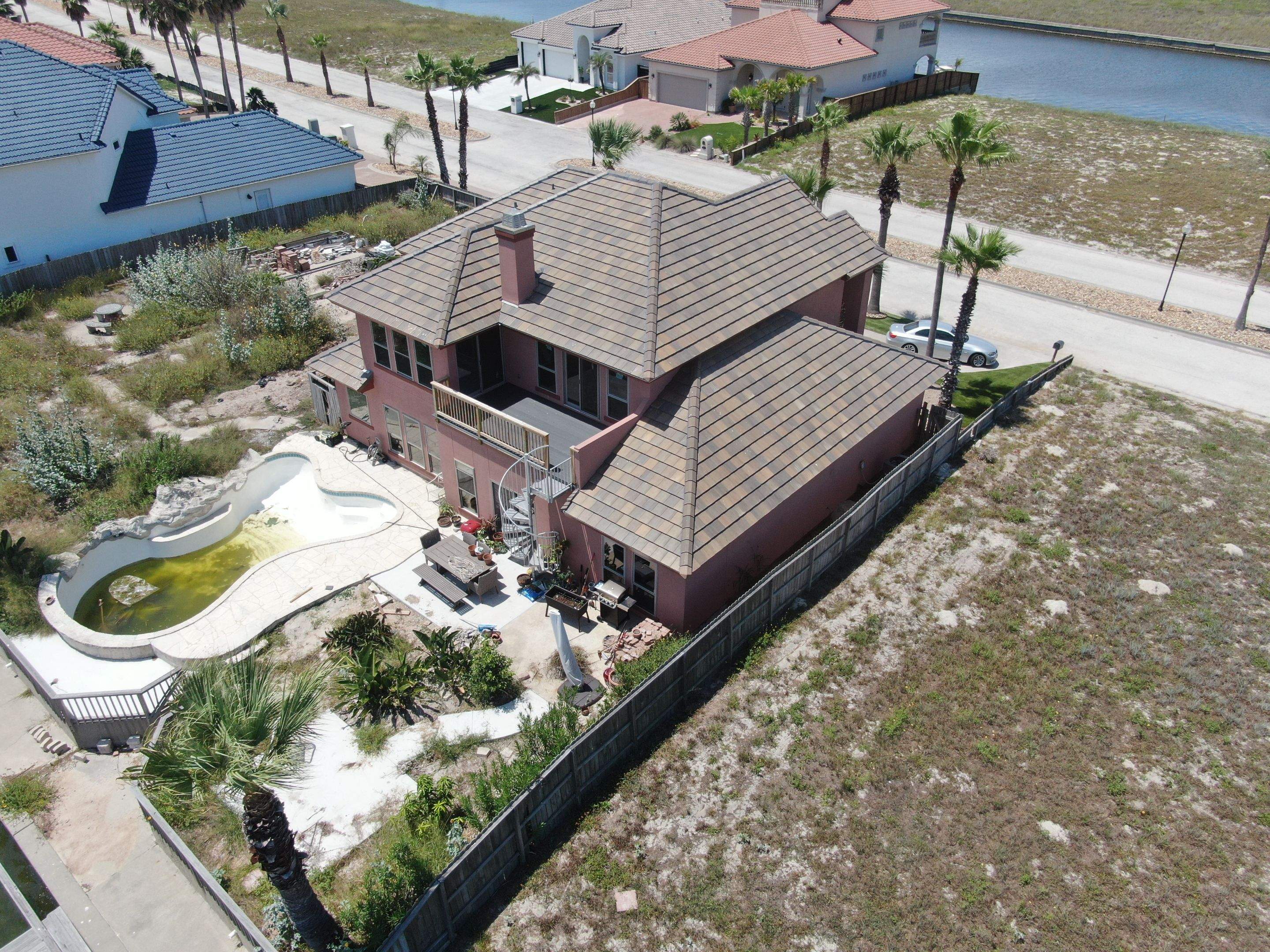 Busted to Beautiful! by Bayfront Roofing and Construction