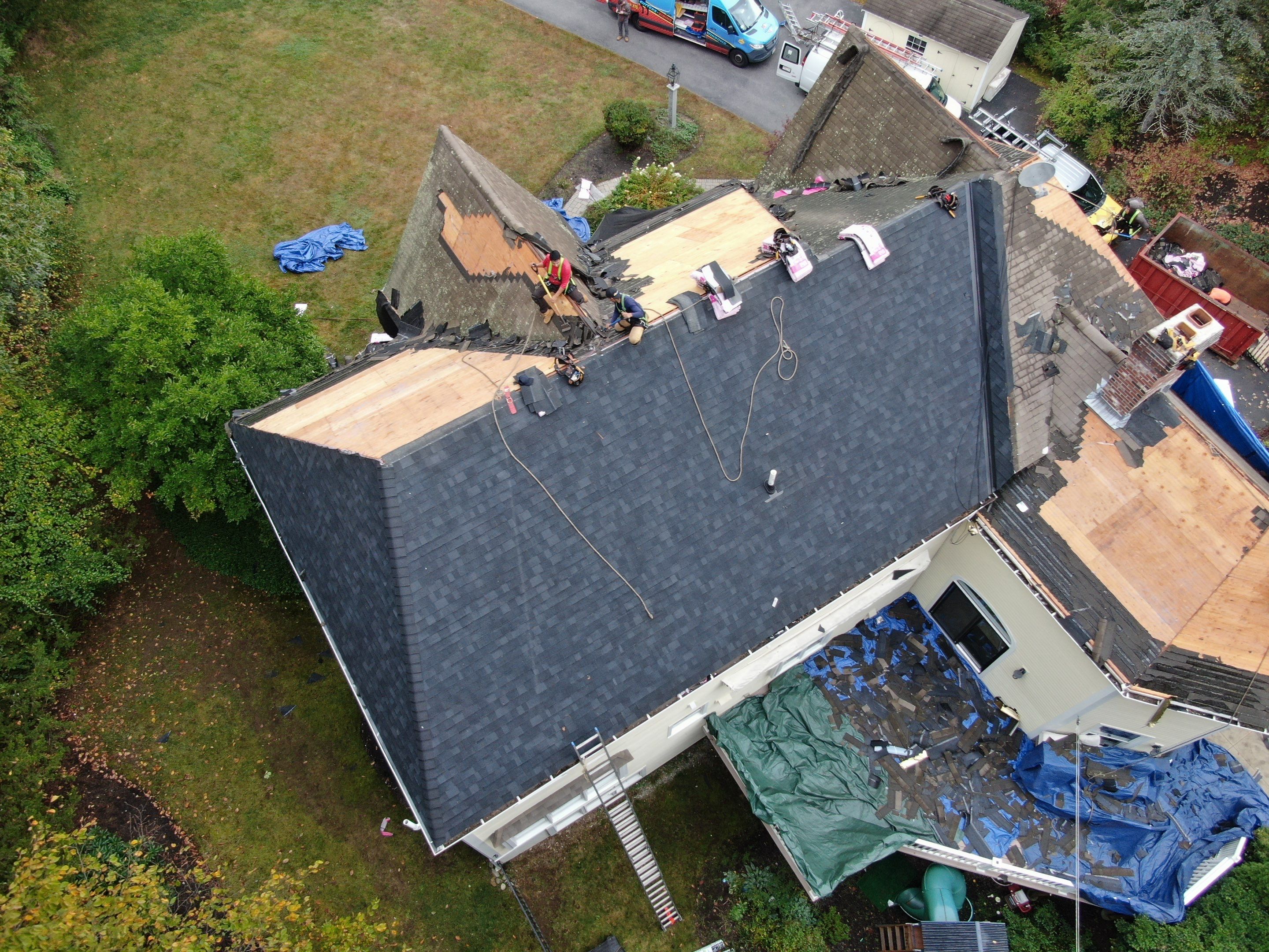 New Roof, Skylights, and Metal Accent Roof Installation in Groton by Mighty Dog Roofing of Greater Middlesex County