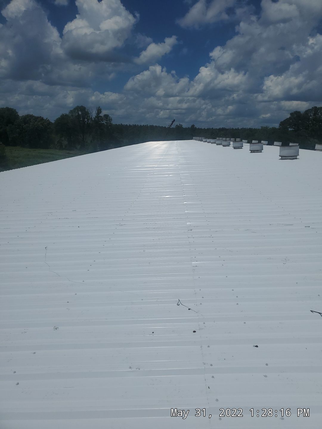 Commercial Roofing Installation using Aluminum Roofing panels by Hostetler Roofing