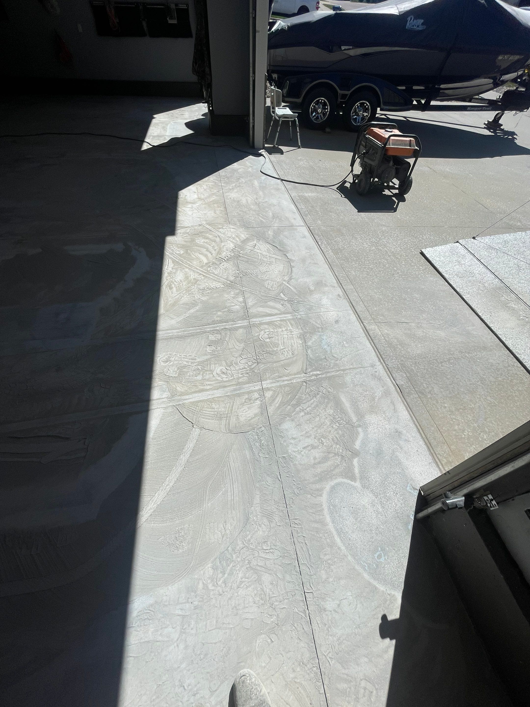 Residential Garage Floor Coating in Sioux Falls by Select Painting, Coatings & Garage Cabinets