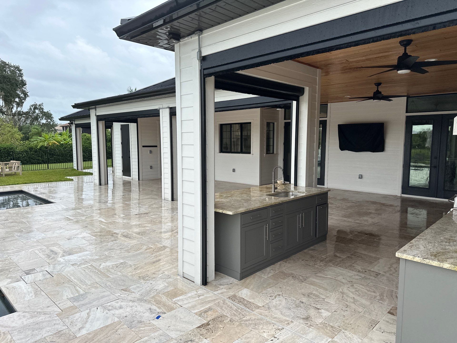 Complete Two-Story House Wash and Driveway Cleaning in Winding River Community, Bradenton, FL by Sunshine AquaWash