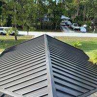 24ga 1.5" Mechanical Seam Dark Bronze by Total Roofing System The Metal Roof Experts
