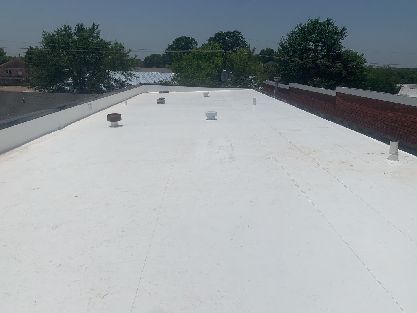 Commercial Roofing Installation using 50 mil PVC by Hostetler Roofing