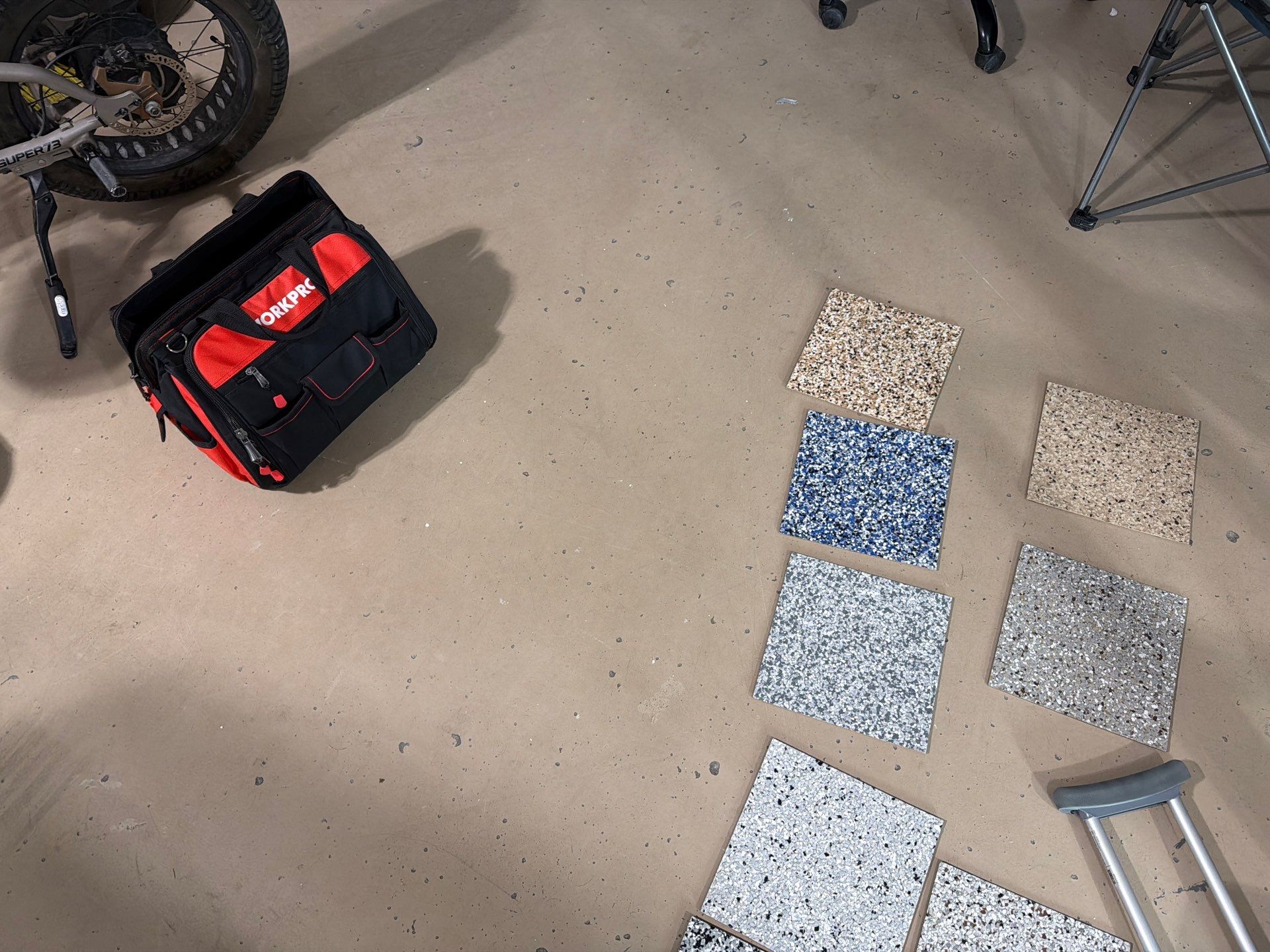 Residential Garage Floor Coating with Grey Speckled Epoxy Finish by Select Painting, Coatings & Garage Cabinets