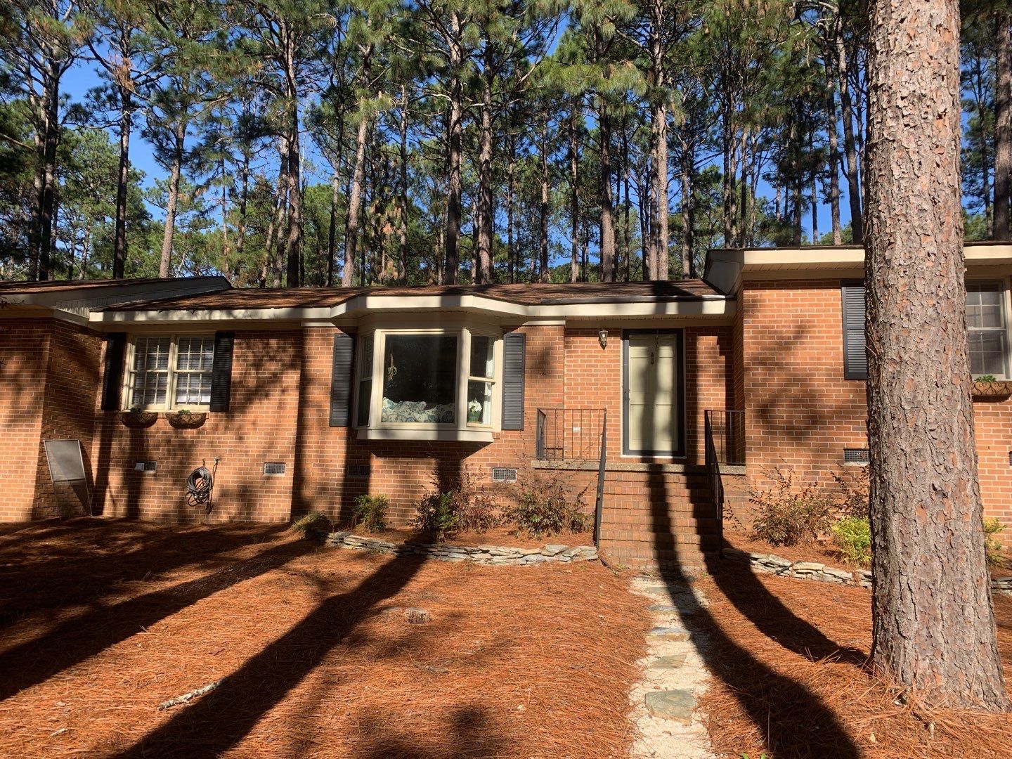 Re Roof by American Roofing NC