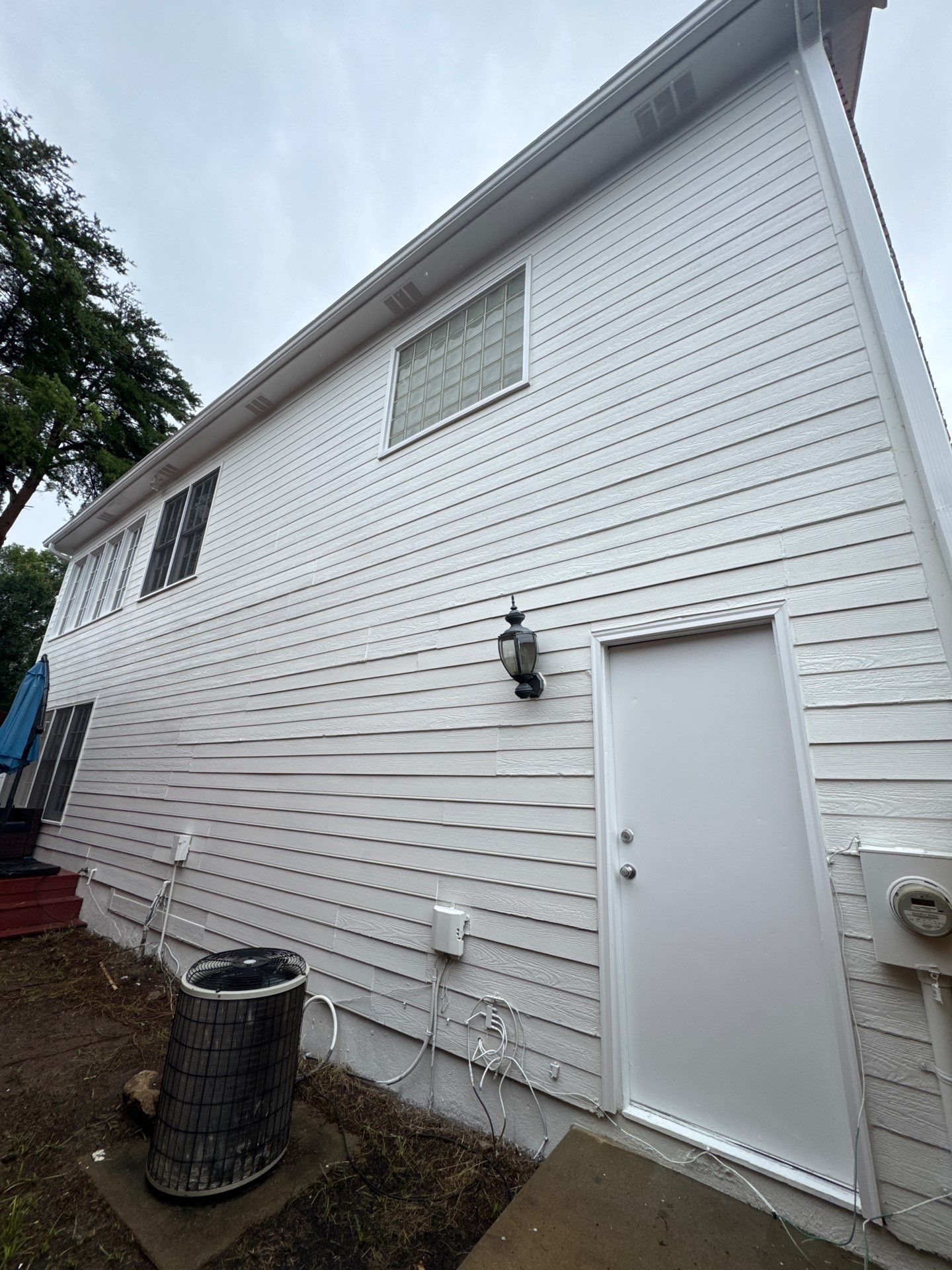 Exterior Siding and Trim Painting for Atlanta Two-Story Home by Swift Home Renovations