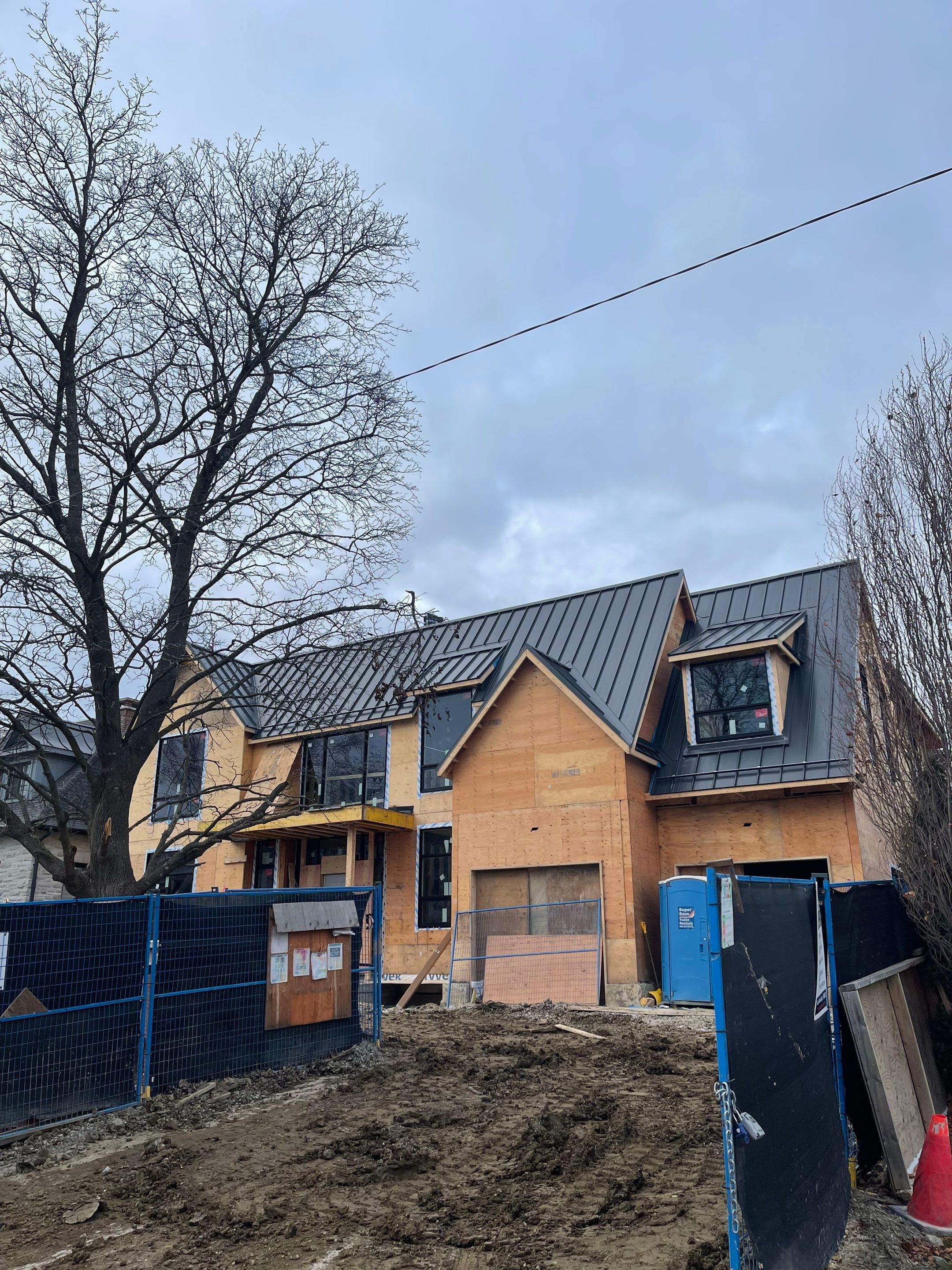 New Home Construction using 16" Standing Seam Panels by Jay Carter Roofing & Sheet Metal
