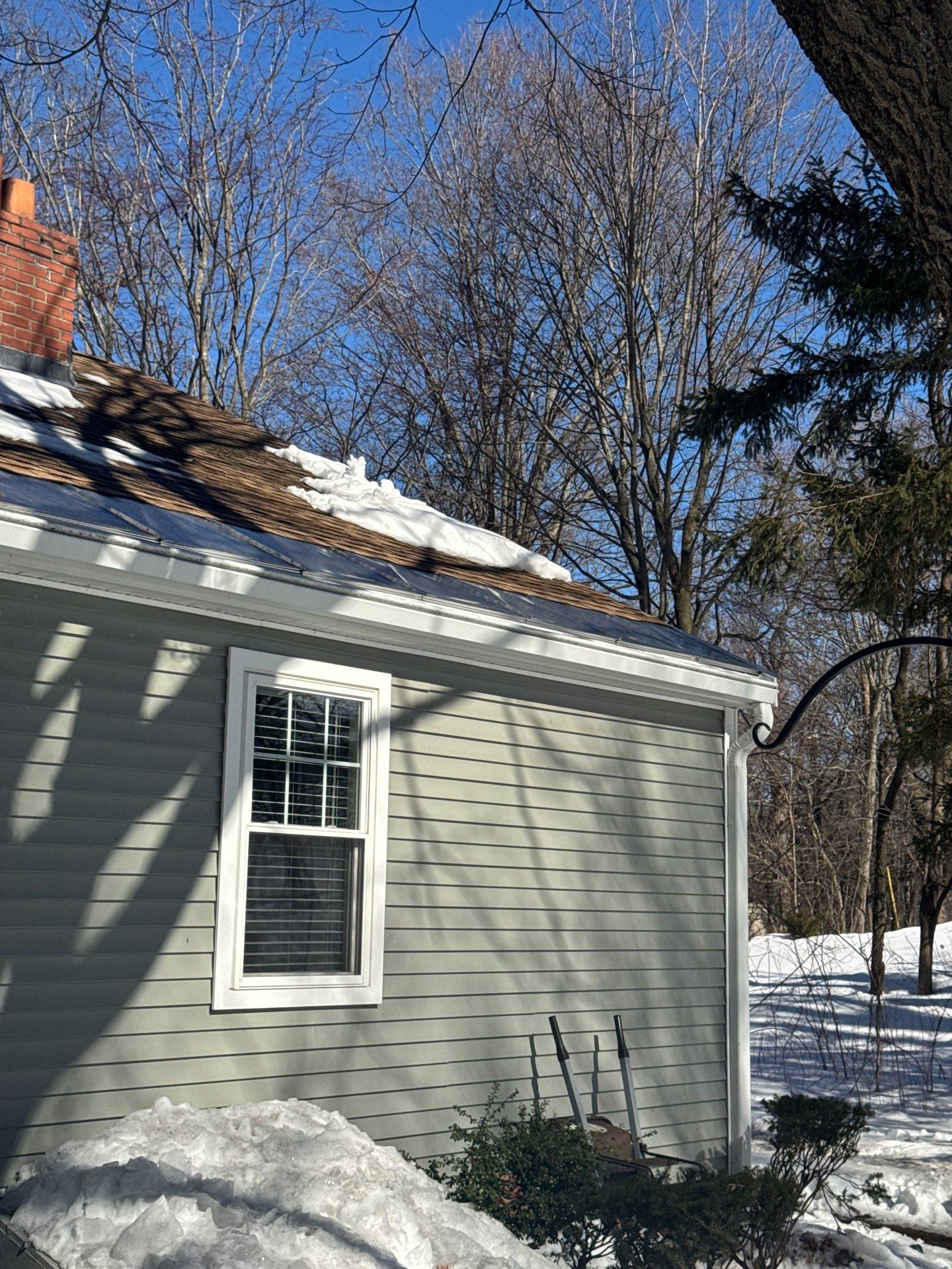 Snow/Ice Belt & Ice Dam Removal Project in Woburn by Mighty Dog Roofing of Greater Middlesex County
