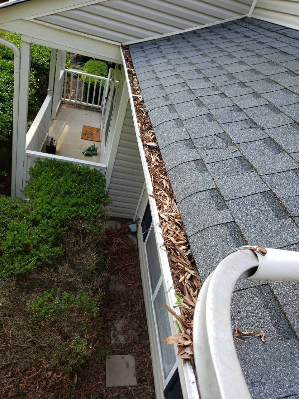 Gutter Cleaning using water by G&H Home Tech Pros LLC