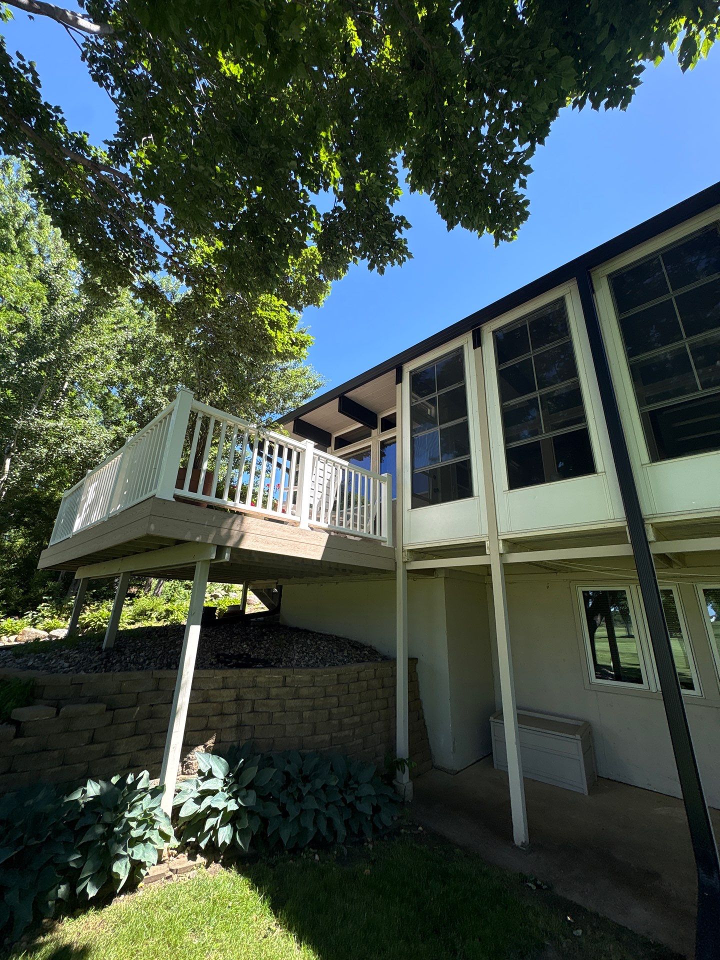 Exterior Trim Painting and Rafter Staining in Sioux Falls by Select Painting, Coatings & Garage Cabinets