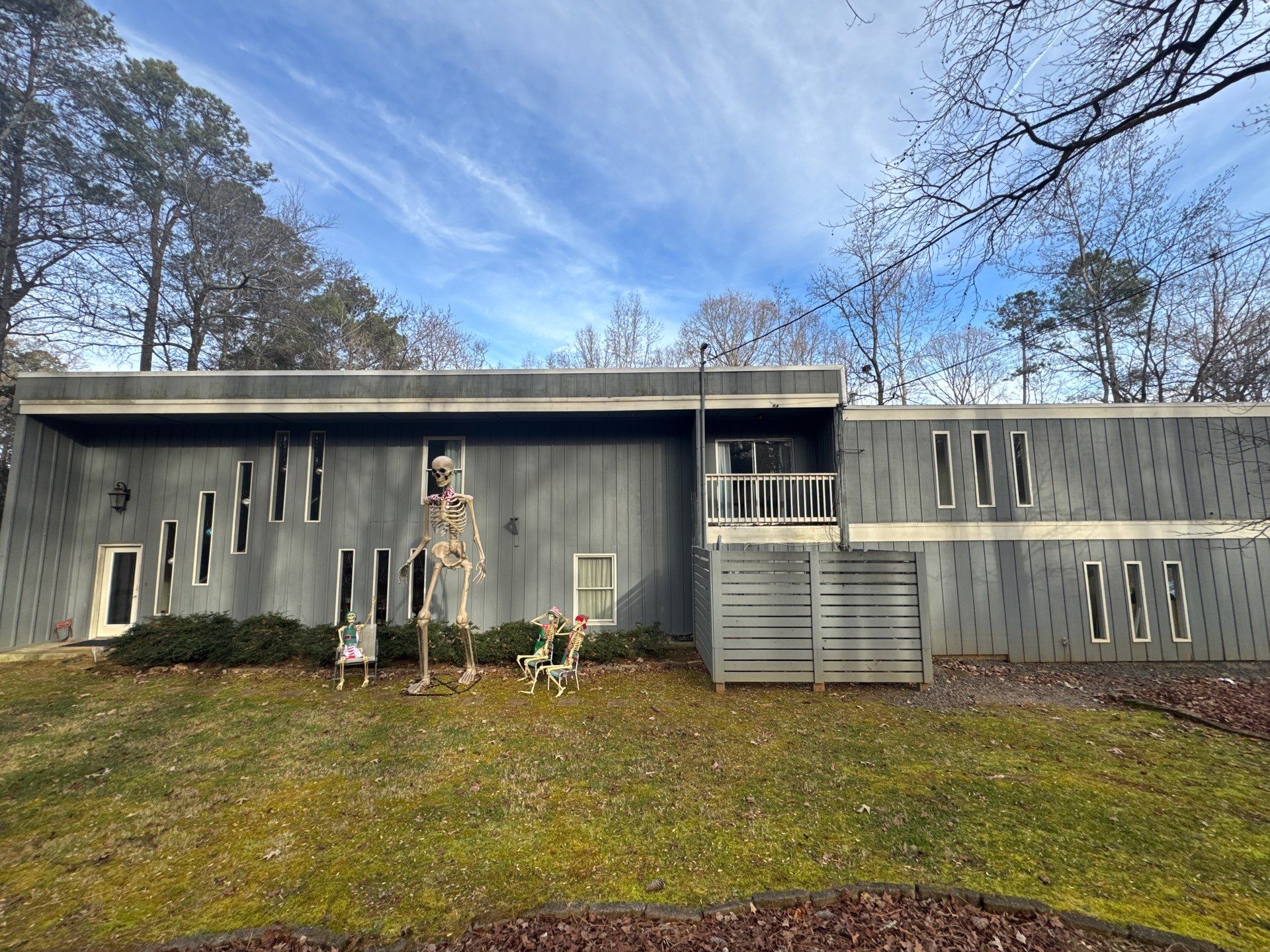 Full Exterior Transformation With Modern Black Finish by Swift Home Renovations