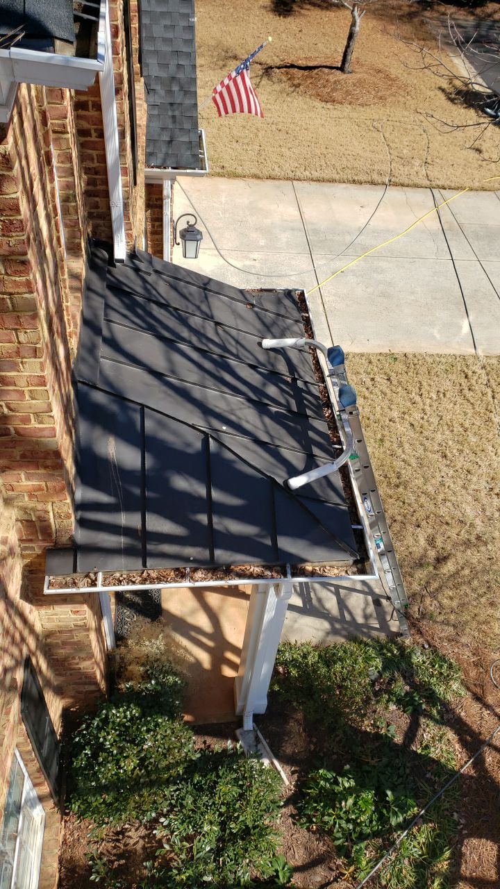 Gutter Cleaning using water by Power Wash Masters LLC