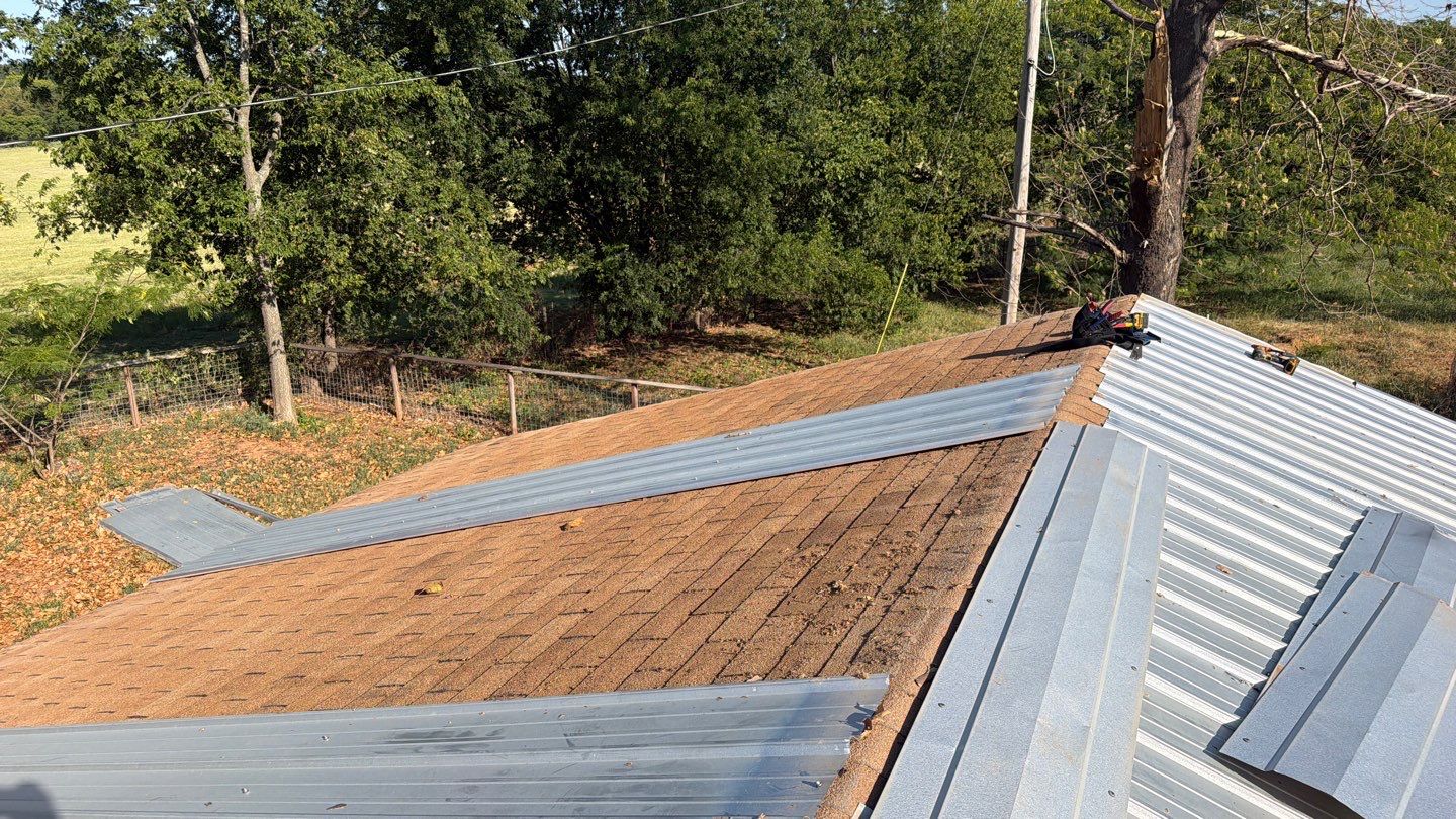 Corrugated Metal Roof Repair for Brick Home in Lindsay by BANA Roofing and Solar Supply