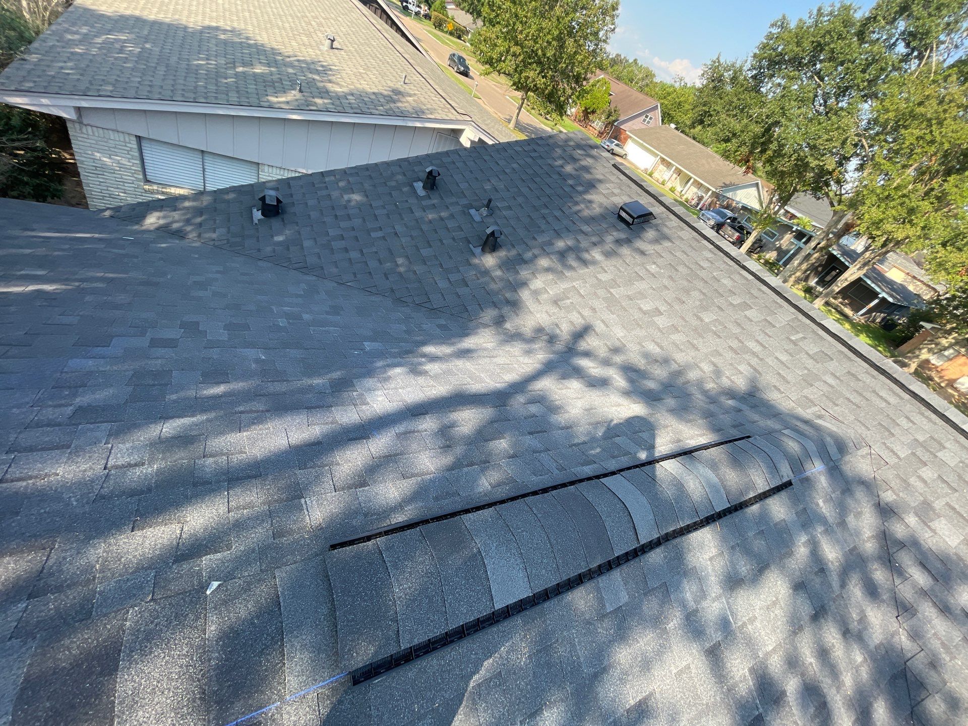 Residential Roofing Installation using Tamko Heritage® Series Rustic Black by CAP Roofing and Construction LLC