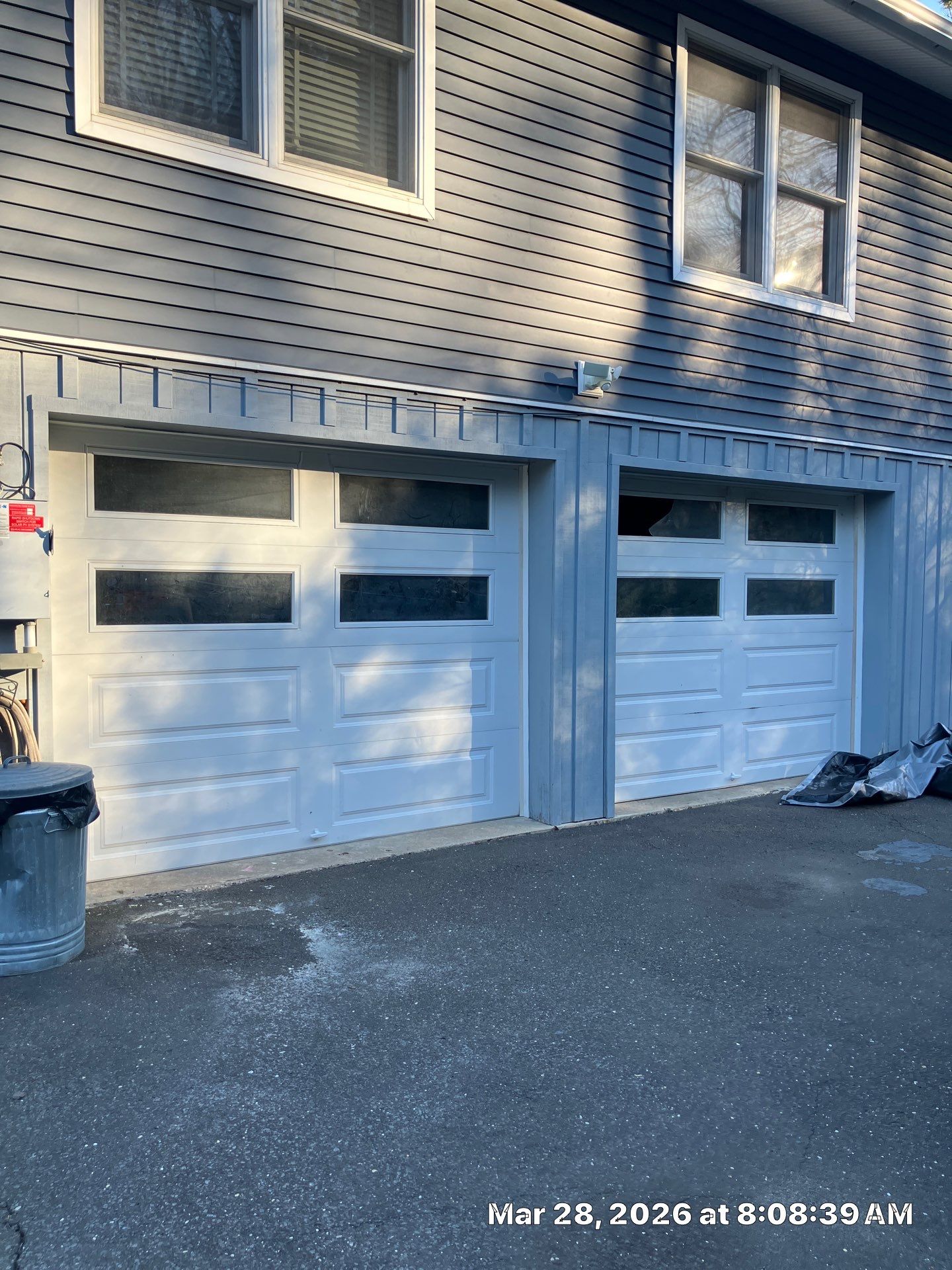 Double Garage Door Upgrade by DiGiorgi Roofing and Siding Inc