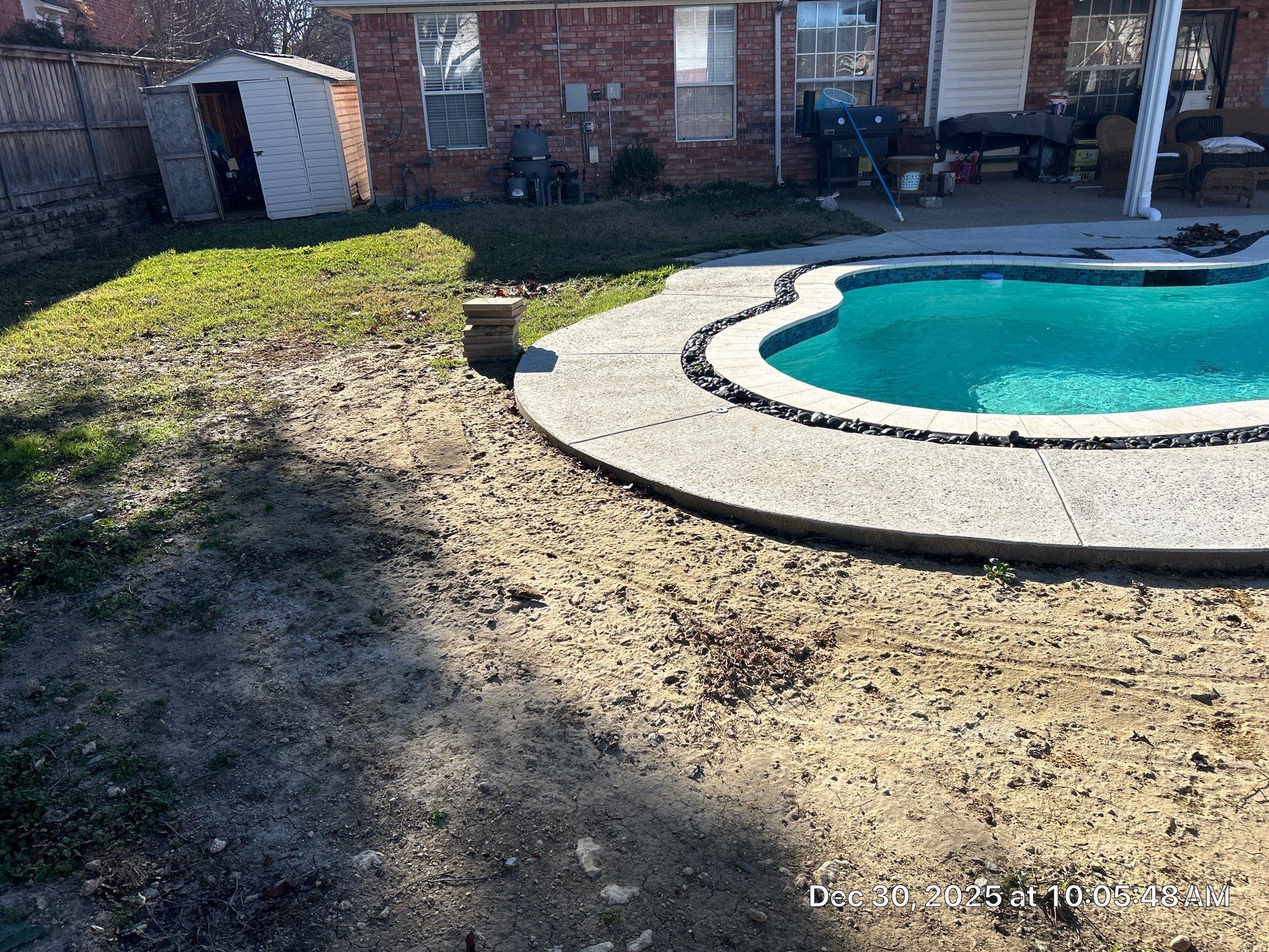 Compact Freeform Spool with Dark Coping by Pinnacle Pools and Spas - DFW