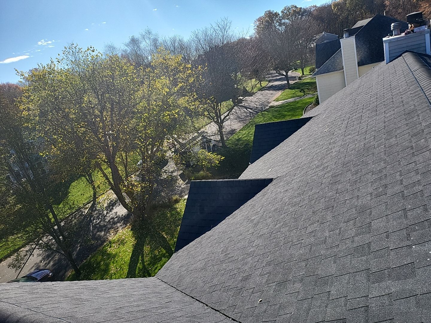 Residential Roofing Installation using Certainteed Landmark Moire Black by A Plus Exterior