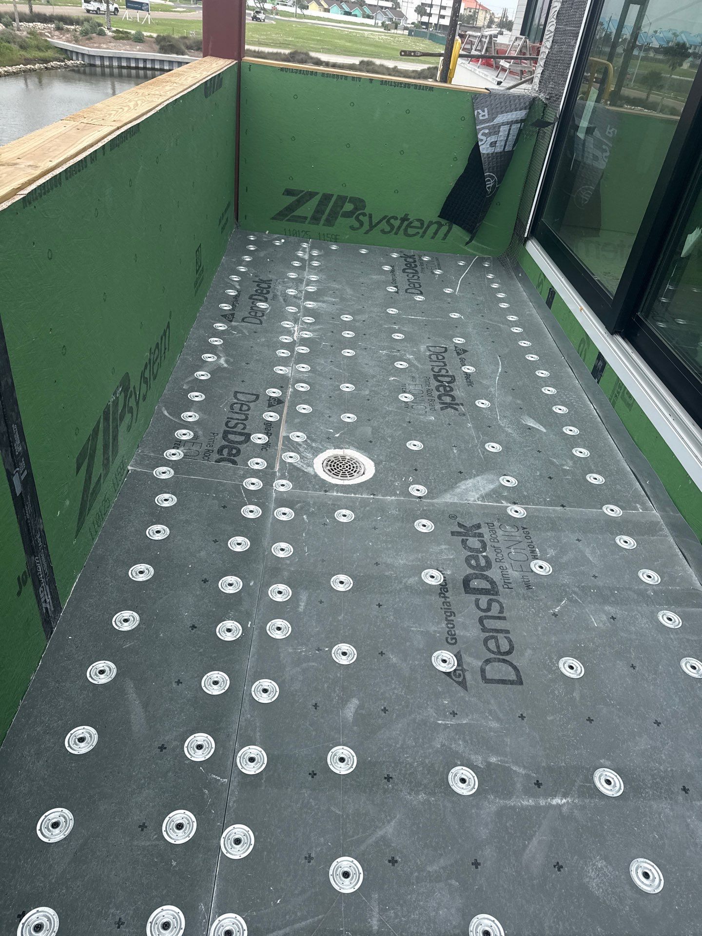 Walk Out, Island Style by Bayfront Roofing and Construction