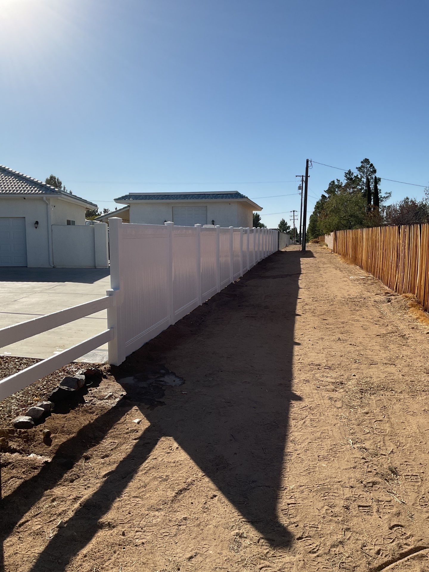 Fence Installation using Ranch Style Vinyl by Fence Guys Inc. 