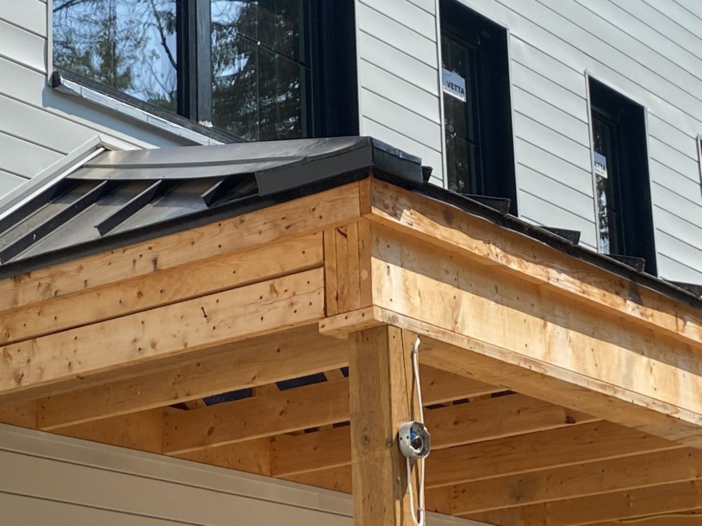 New Home Construction using 16" Standing Seam Panels by Jay Carter Roofing & Sheet Metal