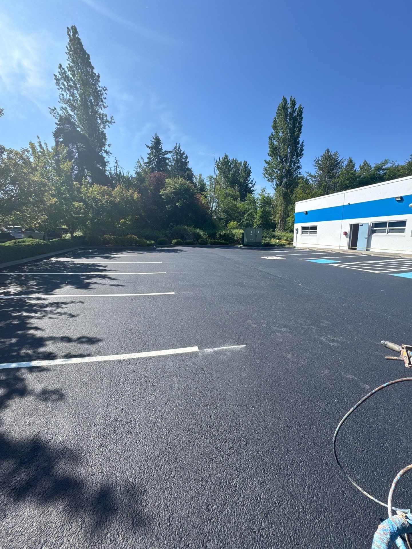 King Machine Business Parking Lot Sealcoat Overlay | Mukilteo by Jireh Asphalt & Concrete Inc 