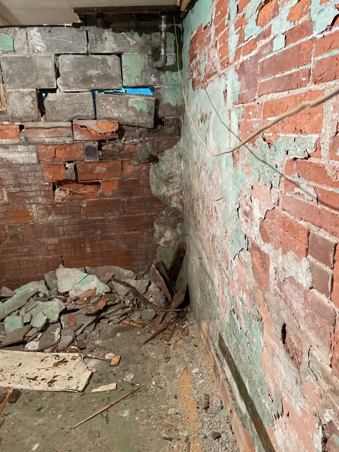 Wall repair with Fortress Invisibeams by ACE Waterproofing & Basement Solutions