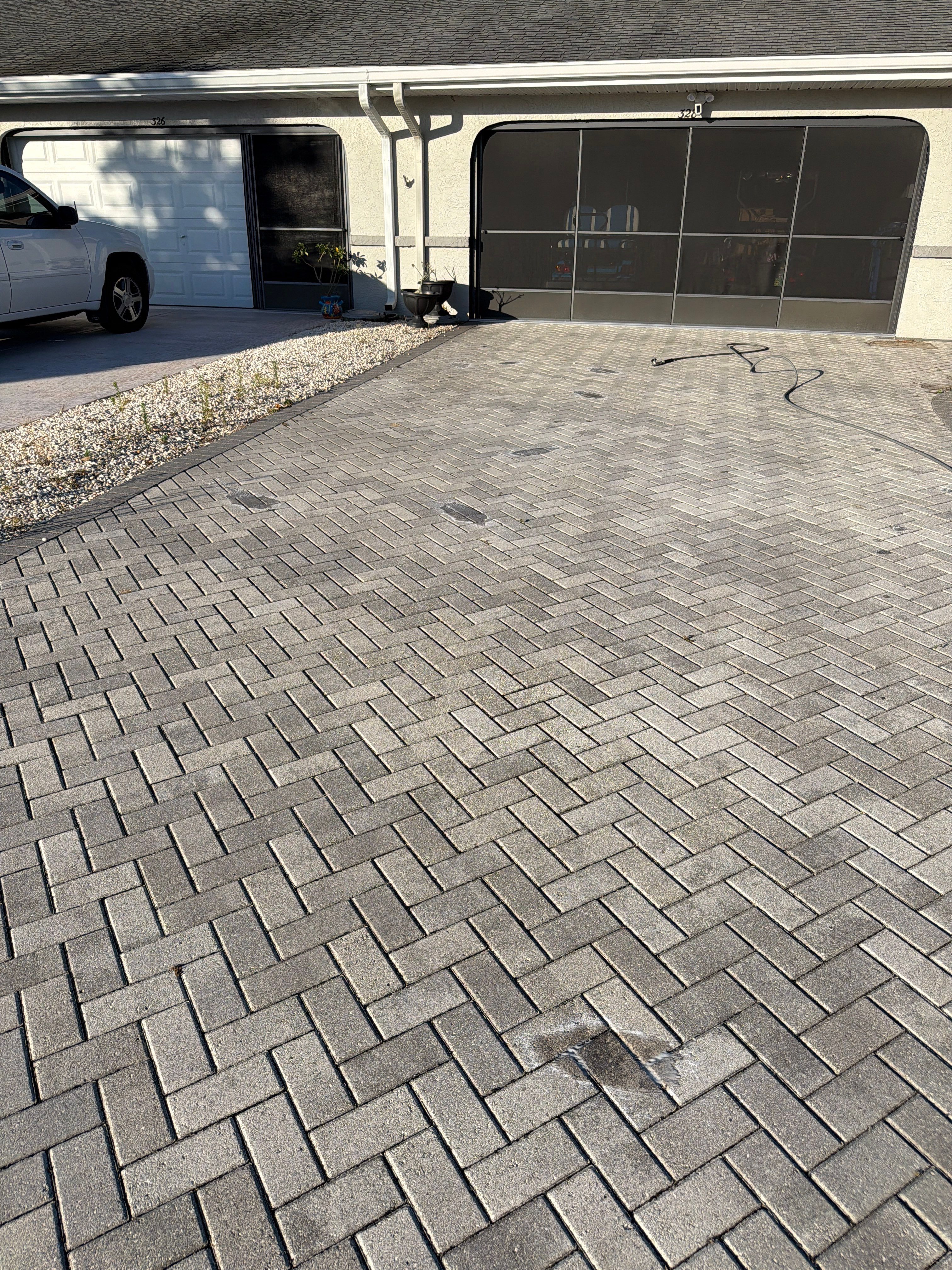 Paver Sealing and Cleaning for Herringbone Driveway in Sun City Center by Supreme Paver Experts