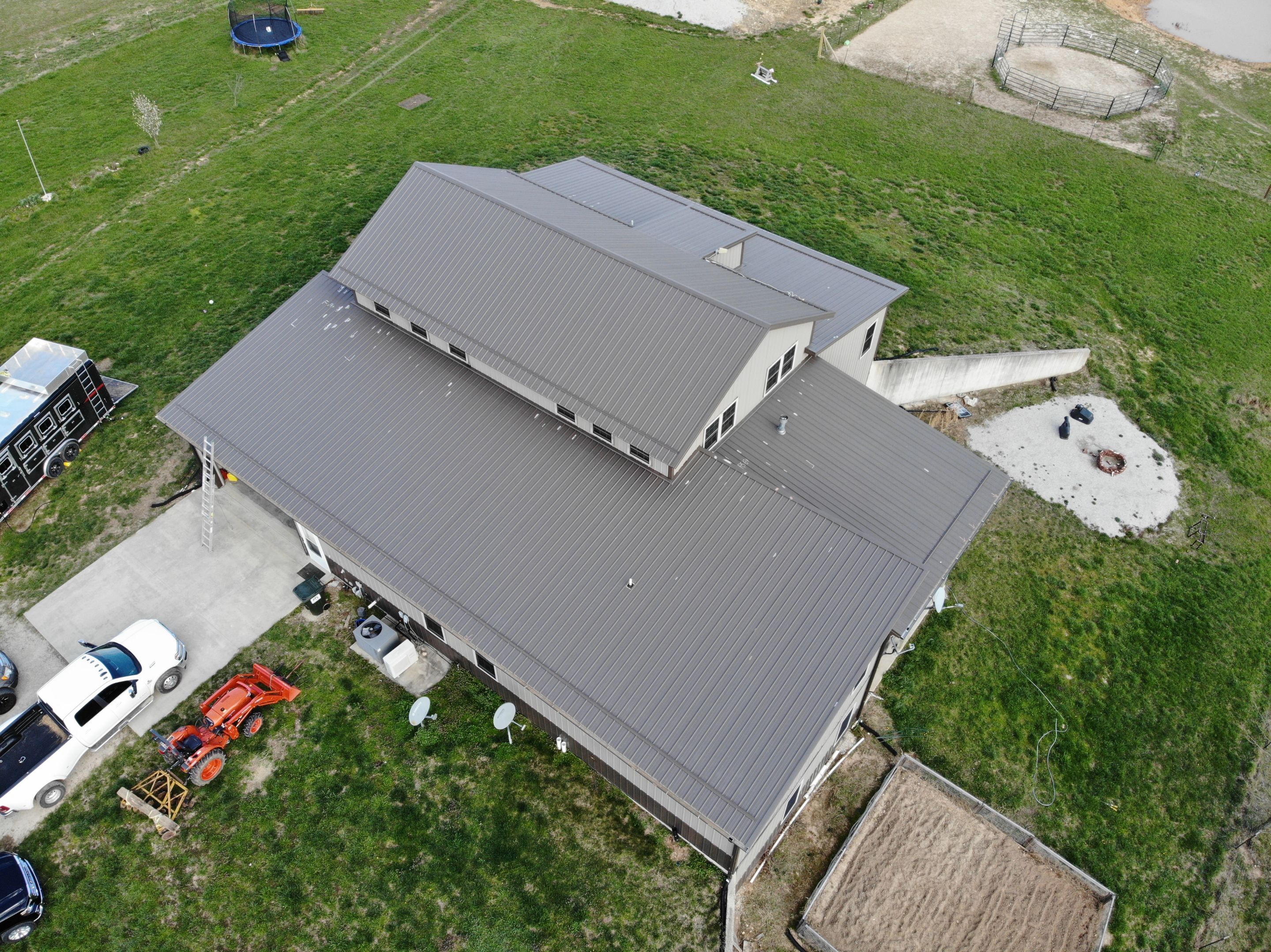 Residential Roofing Install - 29-Gauge G-Rib Metal - Color Burnished Slate  by Titan Commercial & Residential Roofing 