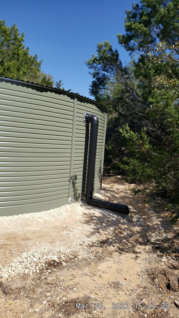30K gallon mangrove green tank for residential rain water harvesting, Dripping Springs, TX by Hill Country Rain Water