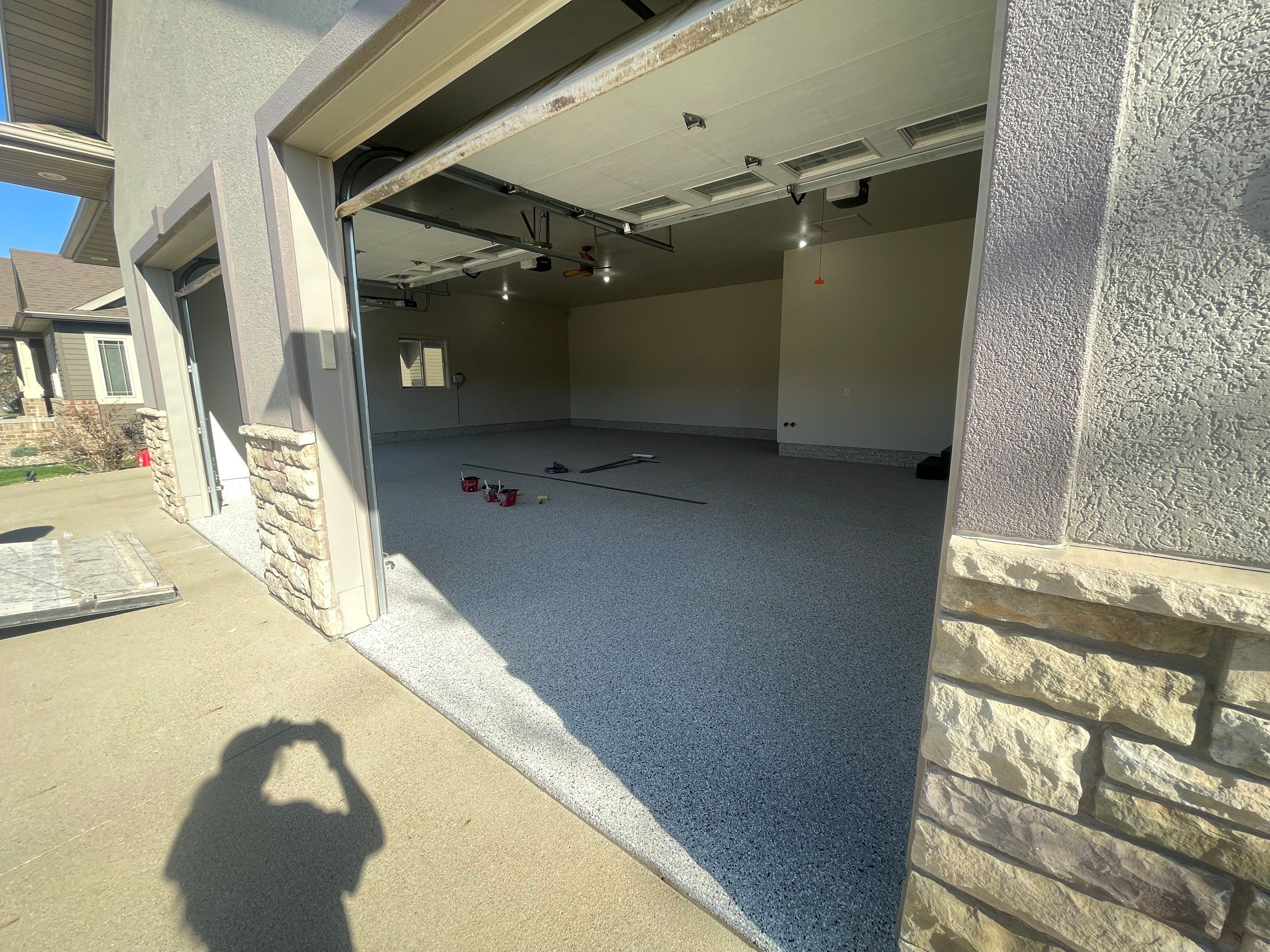 Multi-Car Garage Epoxy Floor Coating in Beresford by Select Painting, Coatings & Garage Cabinets
