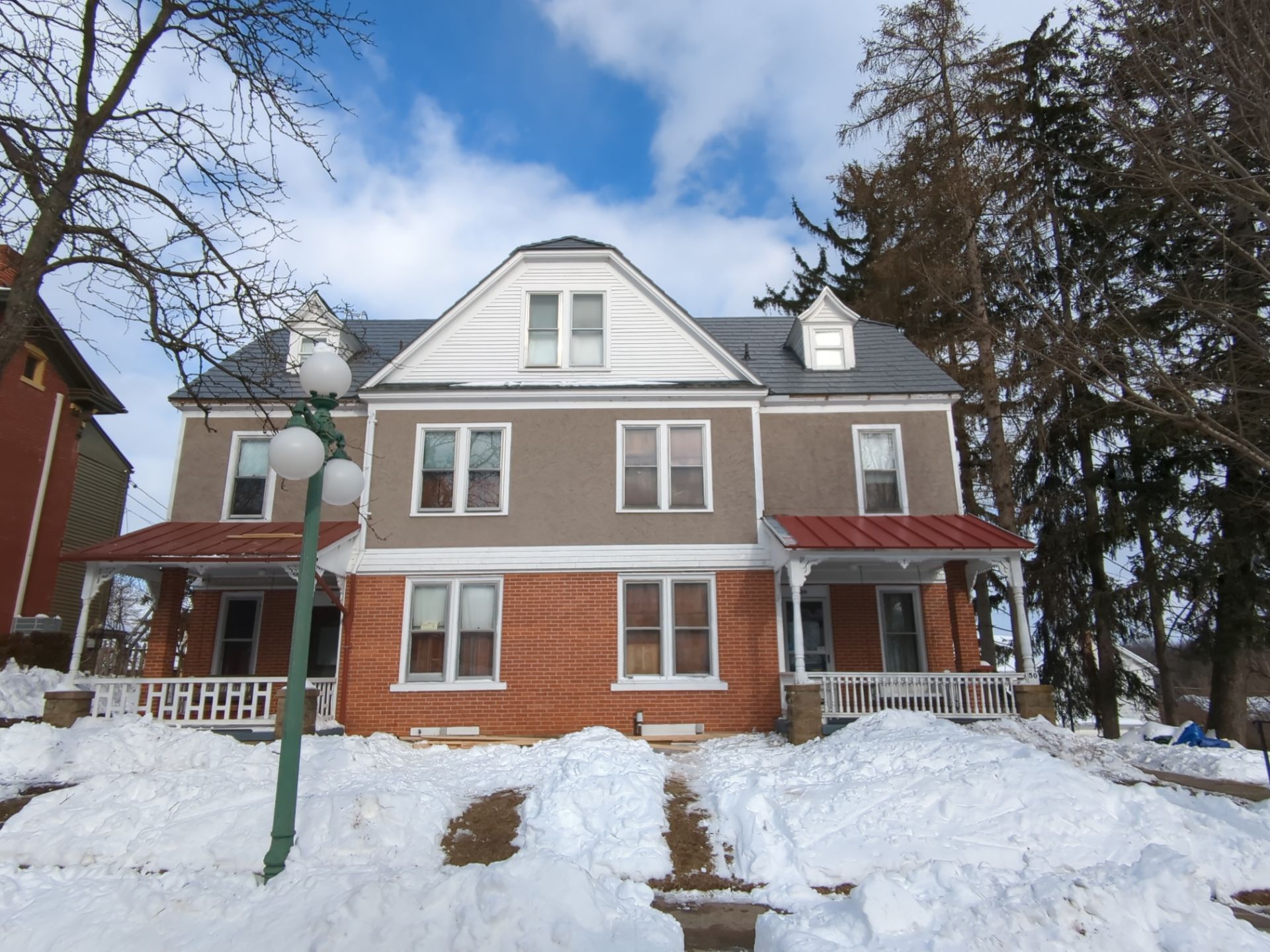 Provia Metal Roofing Installation on Historic Victorian Home by Esh Builders