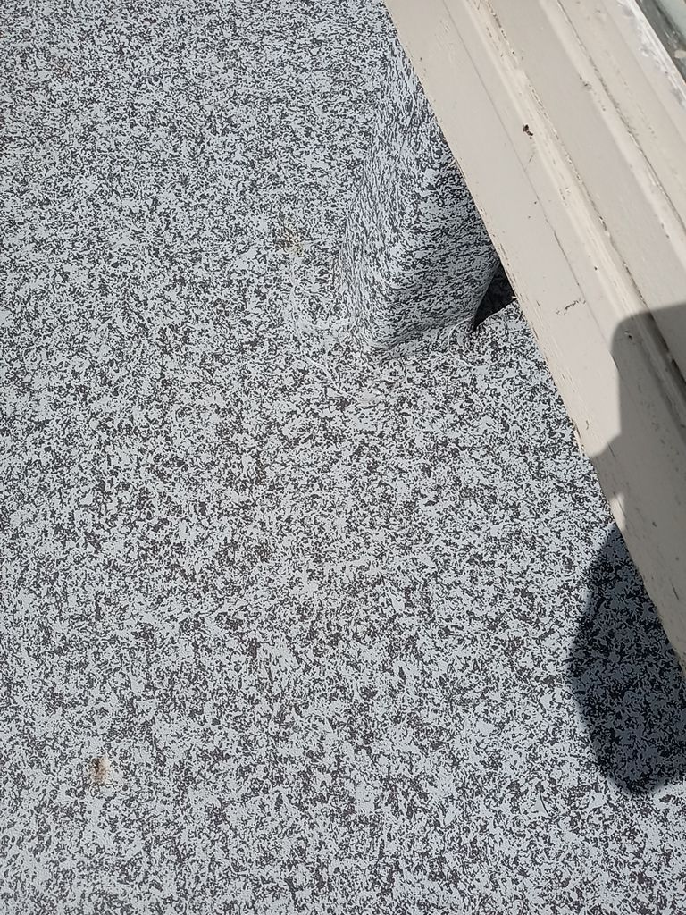 Residential Roofing Installation, Dec-tek walk-out porch roof, siding on garage by Absolute Roofing and Construction