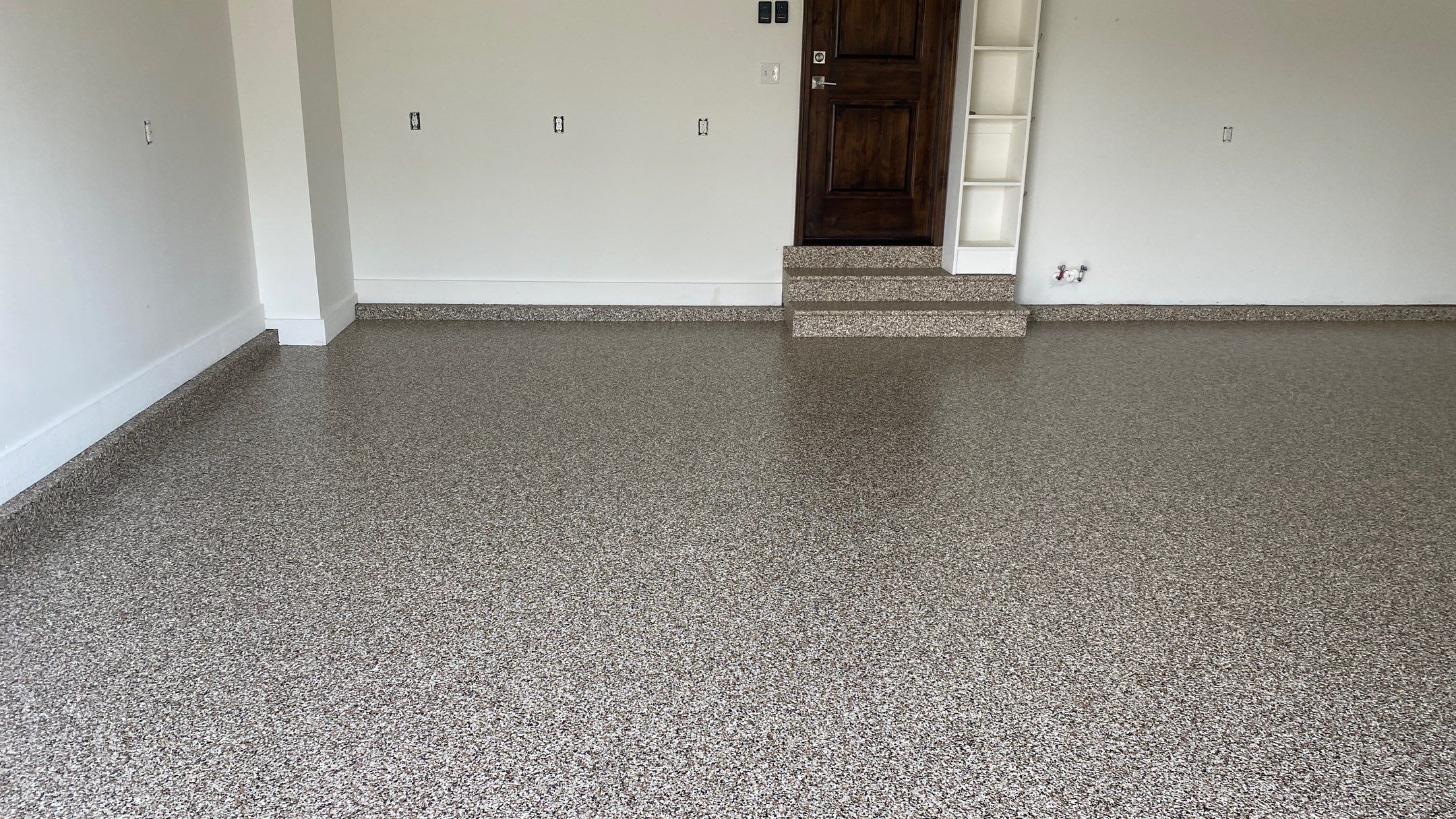 Kenny & Debbie transformed their garage with a Banner Garage Floor and cabinets by Banner Garage