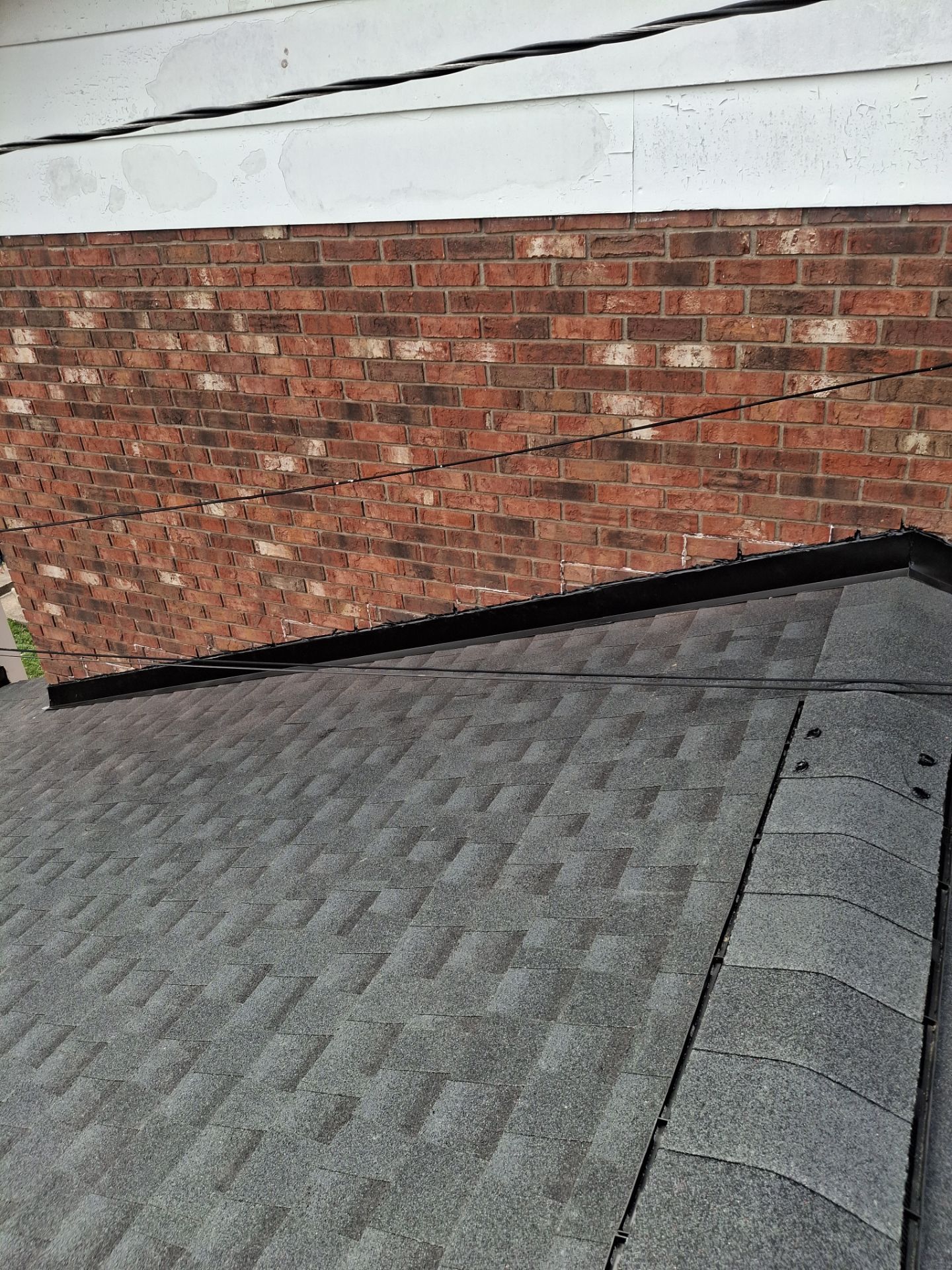 Residential Roofing Installation using GAF Timberline HDZ Charcoal by Rainstoppers Roofing