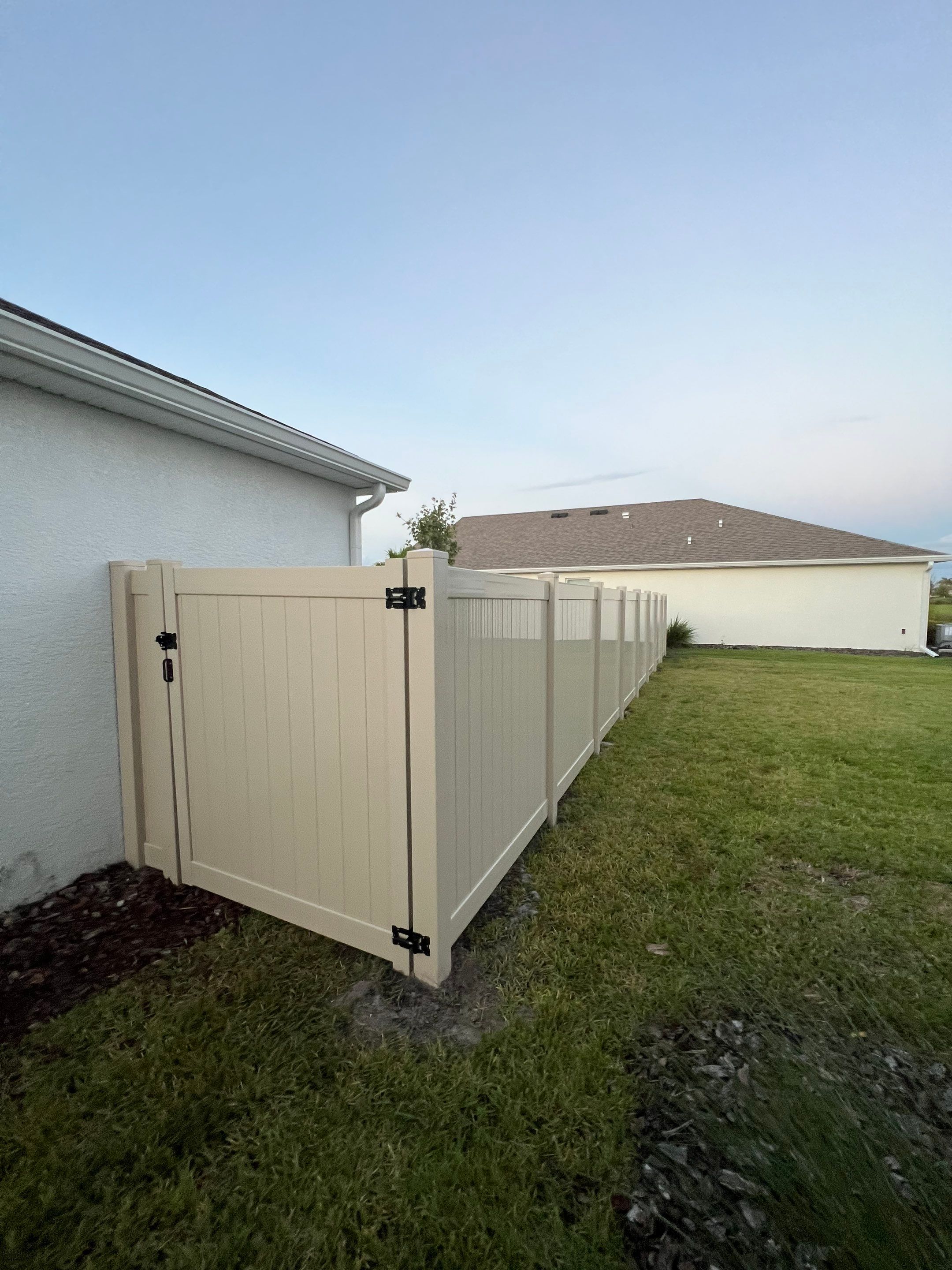 Vinyl Fence Installation using Tan Vinyl Privacy Fence by Asap fence and gates, LLC