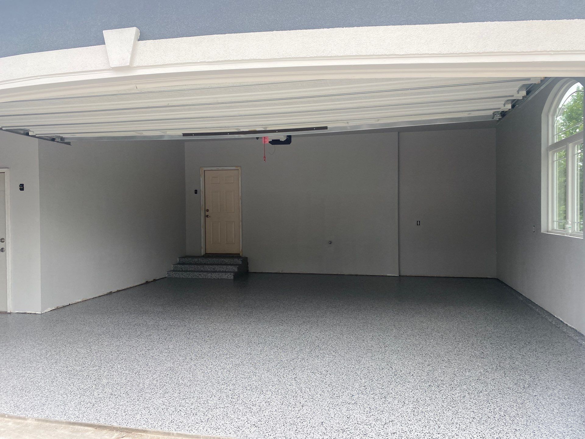 Dennis P. upgraded his garage and patio with a new flake floor by Banner Garage