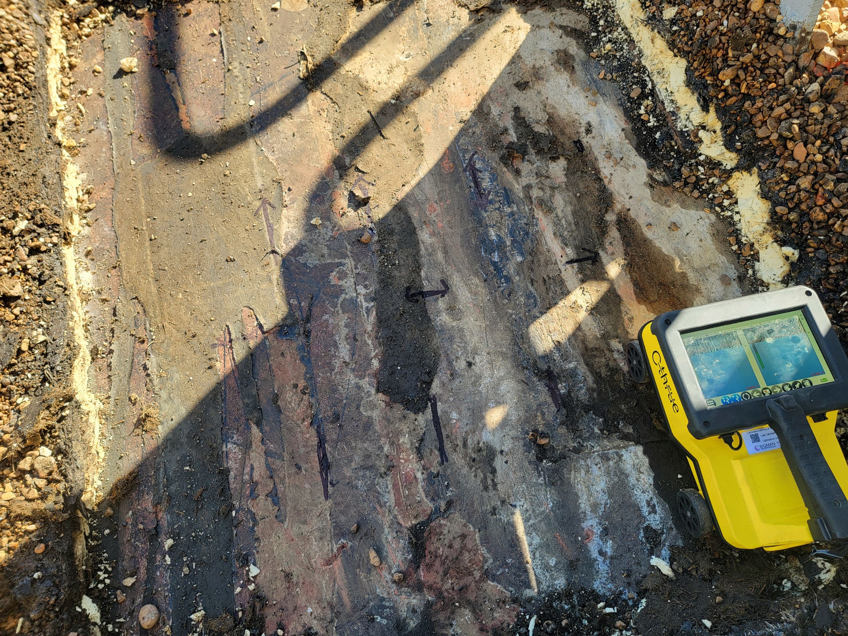 Scanning a roof section for rebar by Alsip Locating Service, LLC