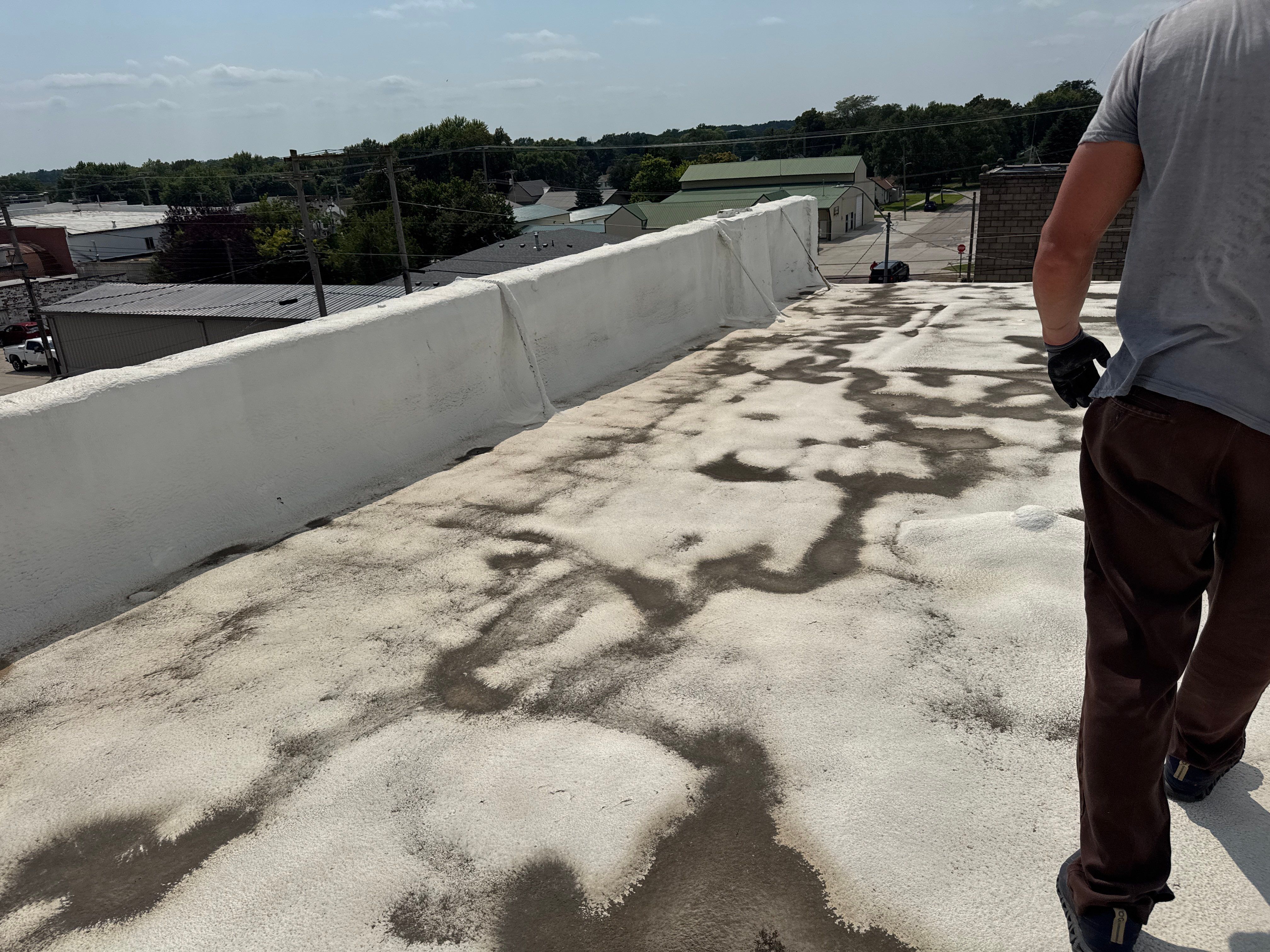 Commercial Flat Roof Elastomeric Coating and Repair in West Point by Crows Roofing LLC
