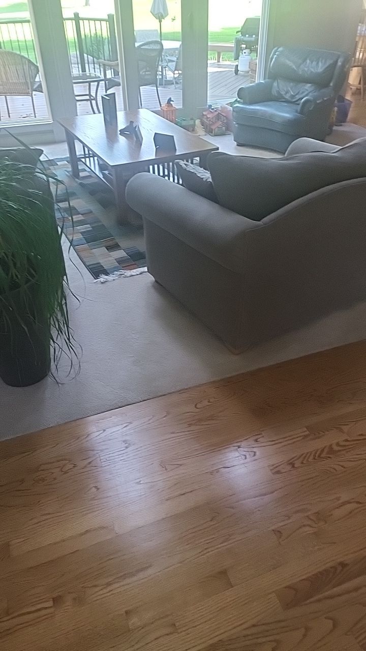Ann Arbor Elegance: Red Oak and Walnut Living Room Masterpiece by Ann Arbor Hardwoods