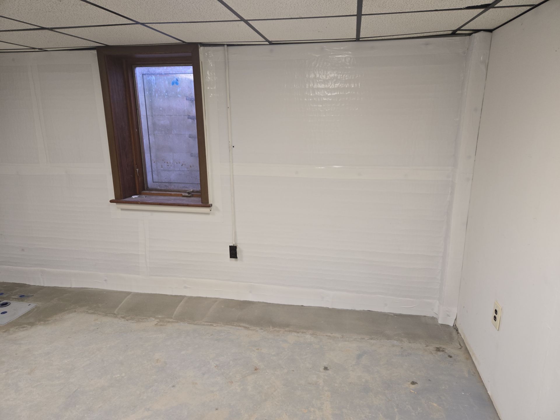 Interior Basement Waterproofing System with Embedded Fiber Reinforcement by Toledo Basement Repair 