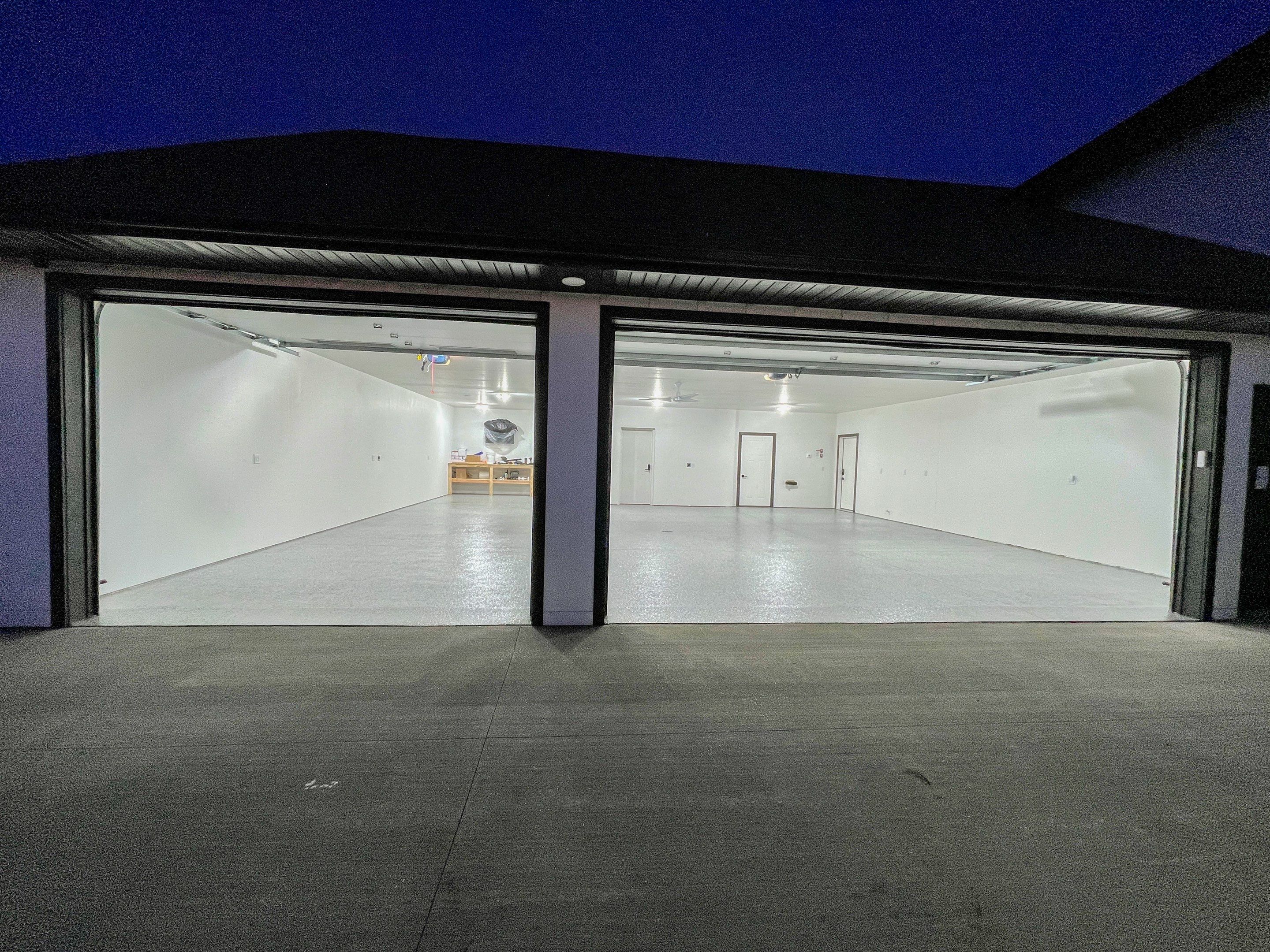 Garage using Slate Stone by Select Painting, Coatings & Garage Cabinets