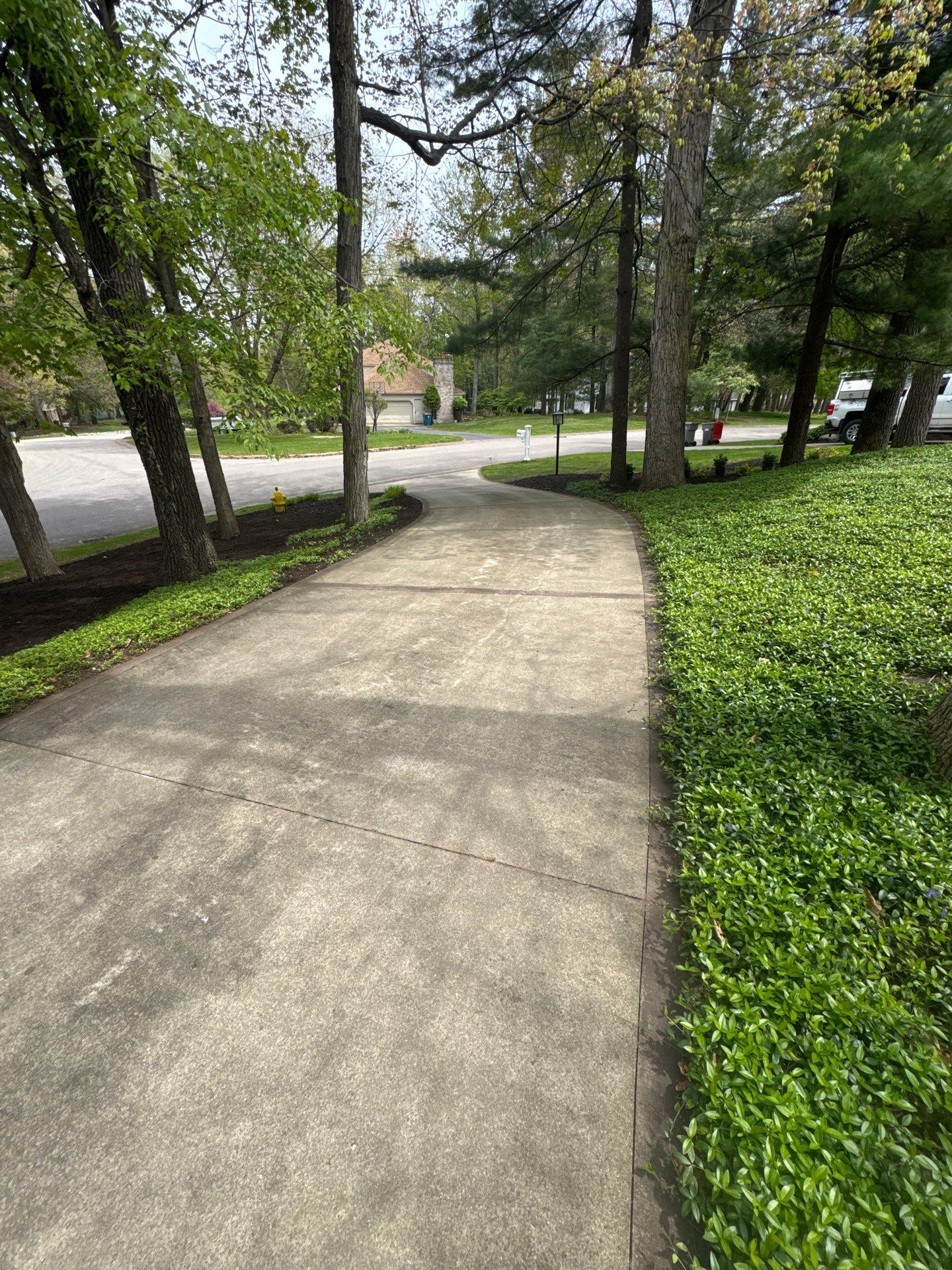 Concrete Driveway and Walkway Staining With Espresso Borders in Grand Rapids by Gordon Painting