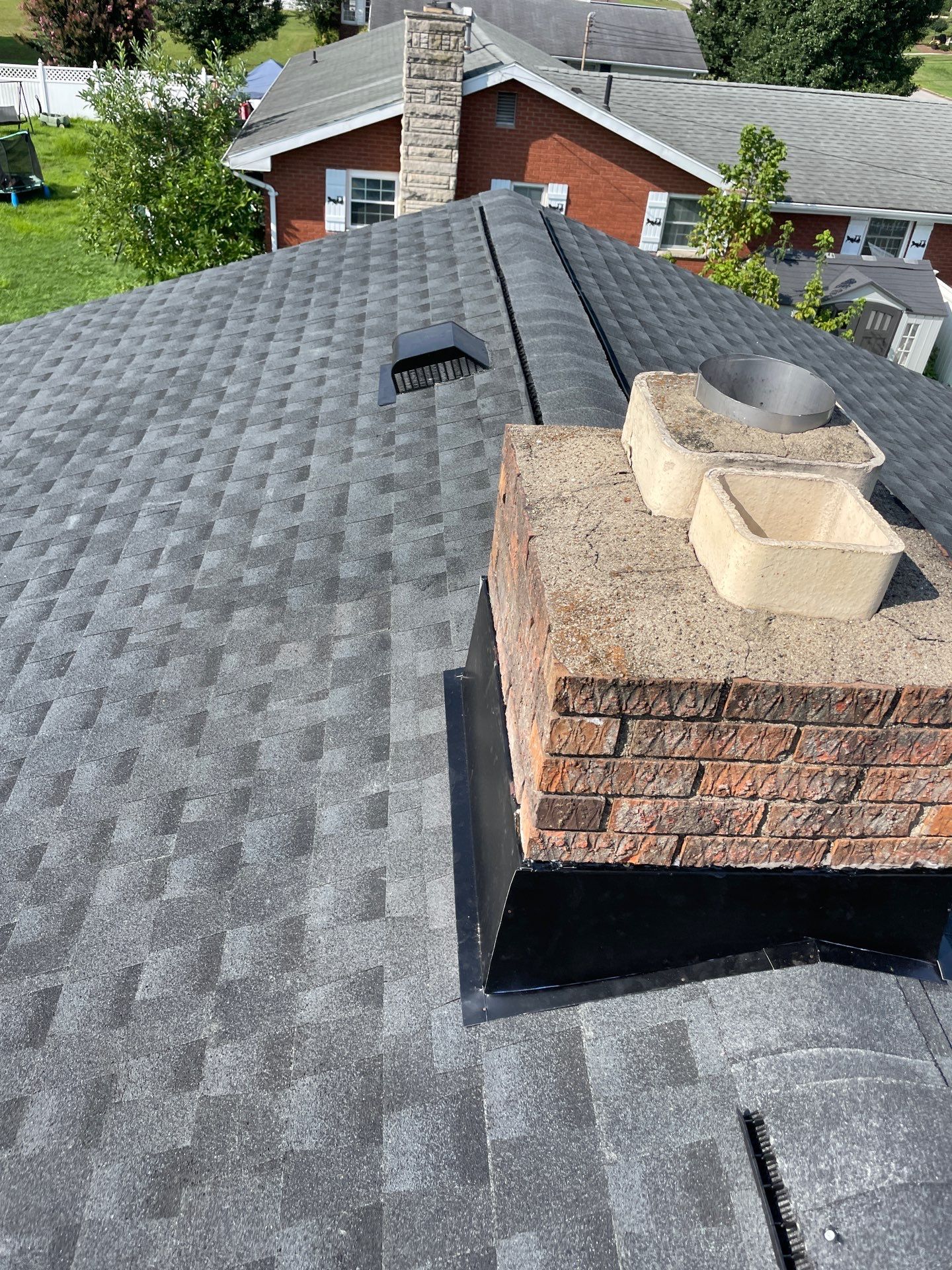 Residential Roofing Installation using GAF Timberline HDZ Charcoal by Rainstoppers Roofing