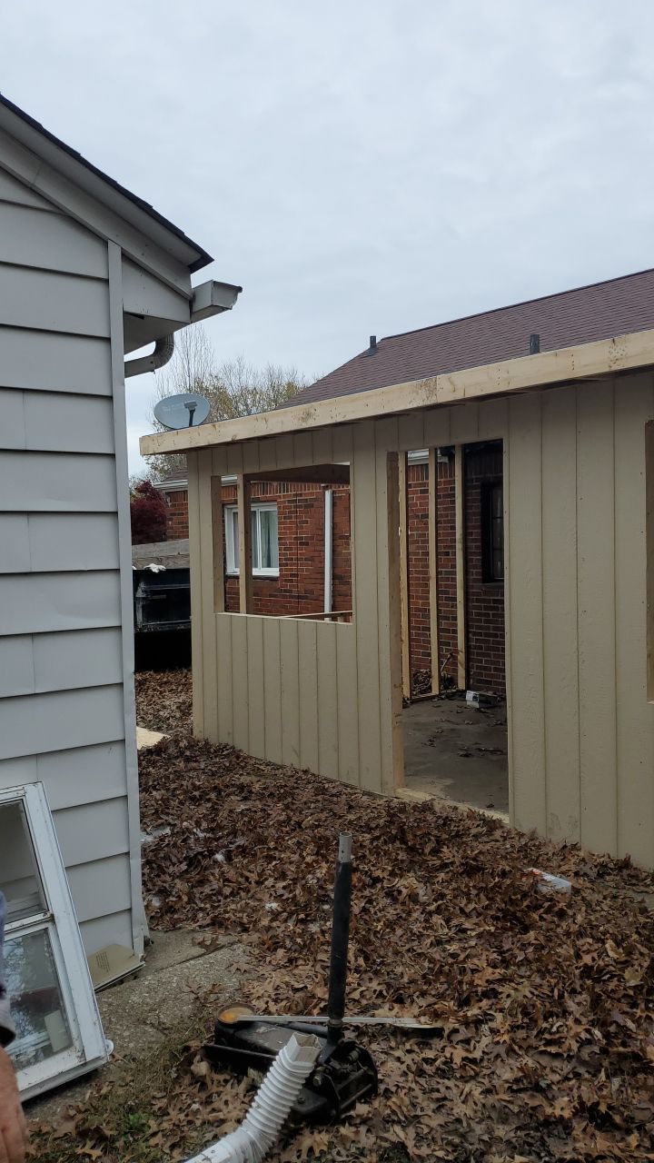 Tree Destroyed Patio Room by Absolute Roofing and Construction